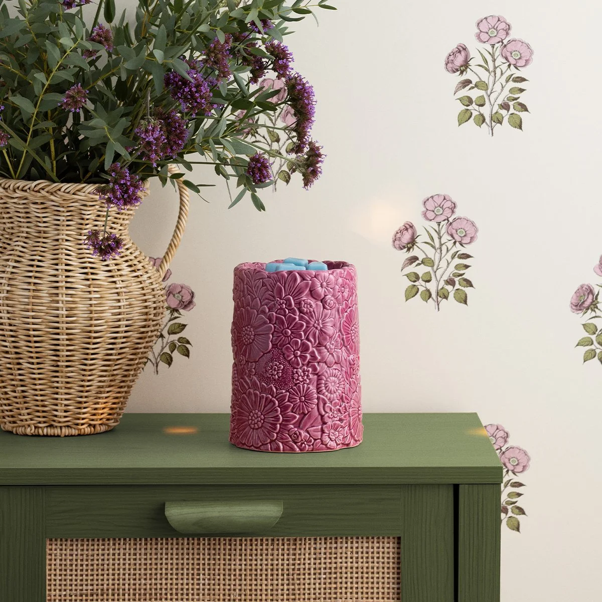 Dusky Petals Scentsy warmer with floral texture styled on a green cabinet
