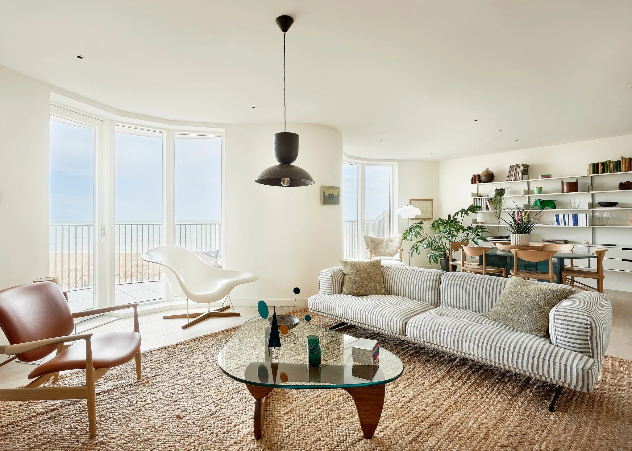 Natural light, clean lines and woven carpets create a seaside home with year-round comforts.  Come and view a property today, show homes open daily.