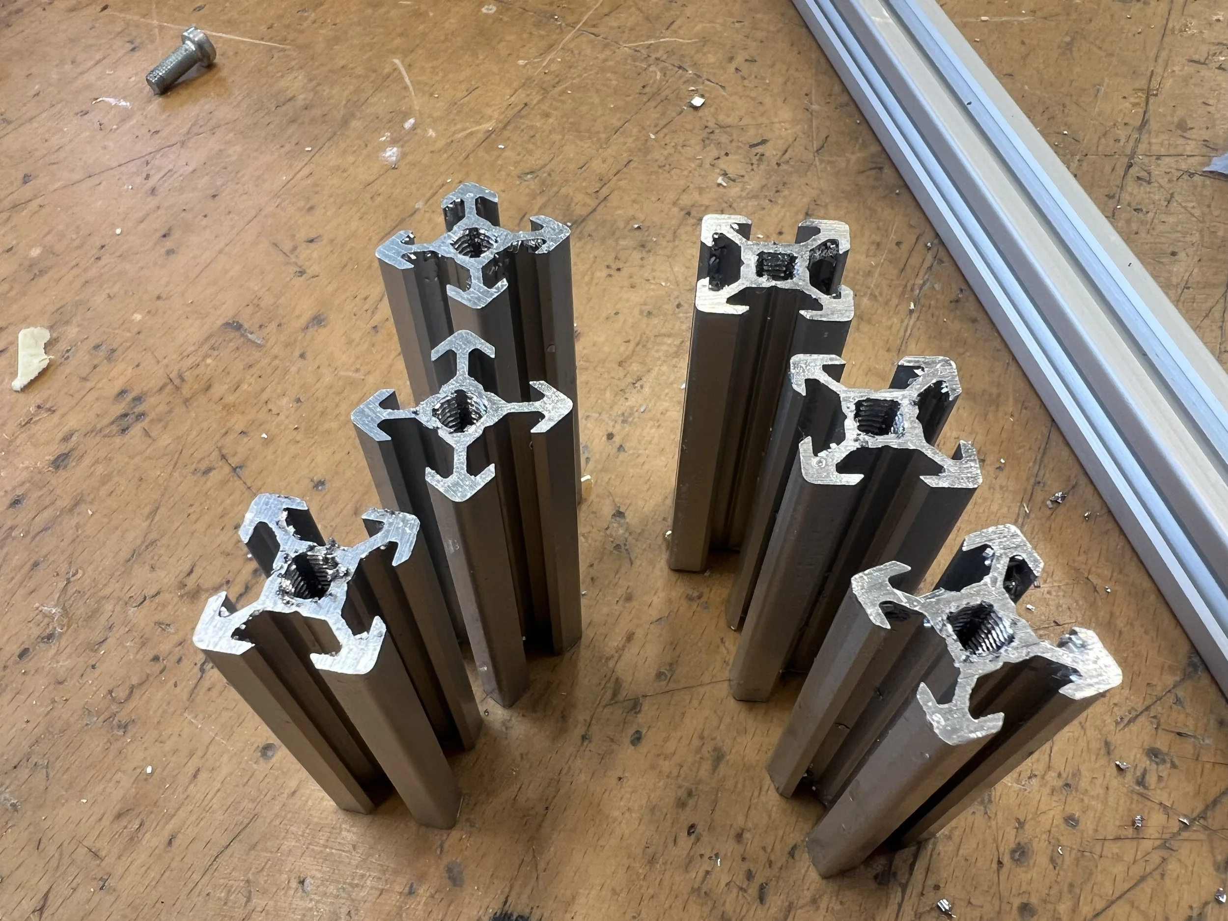 The remaining aluminum profiles were cut using a cross-cut saw and tapped accordingly.