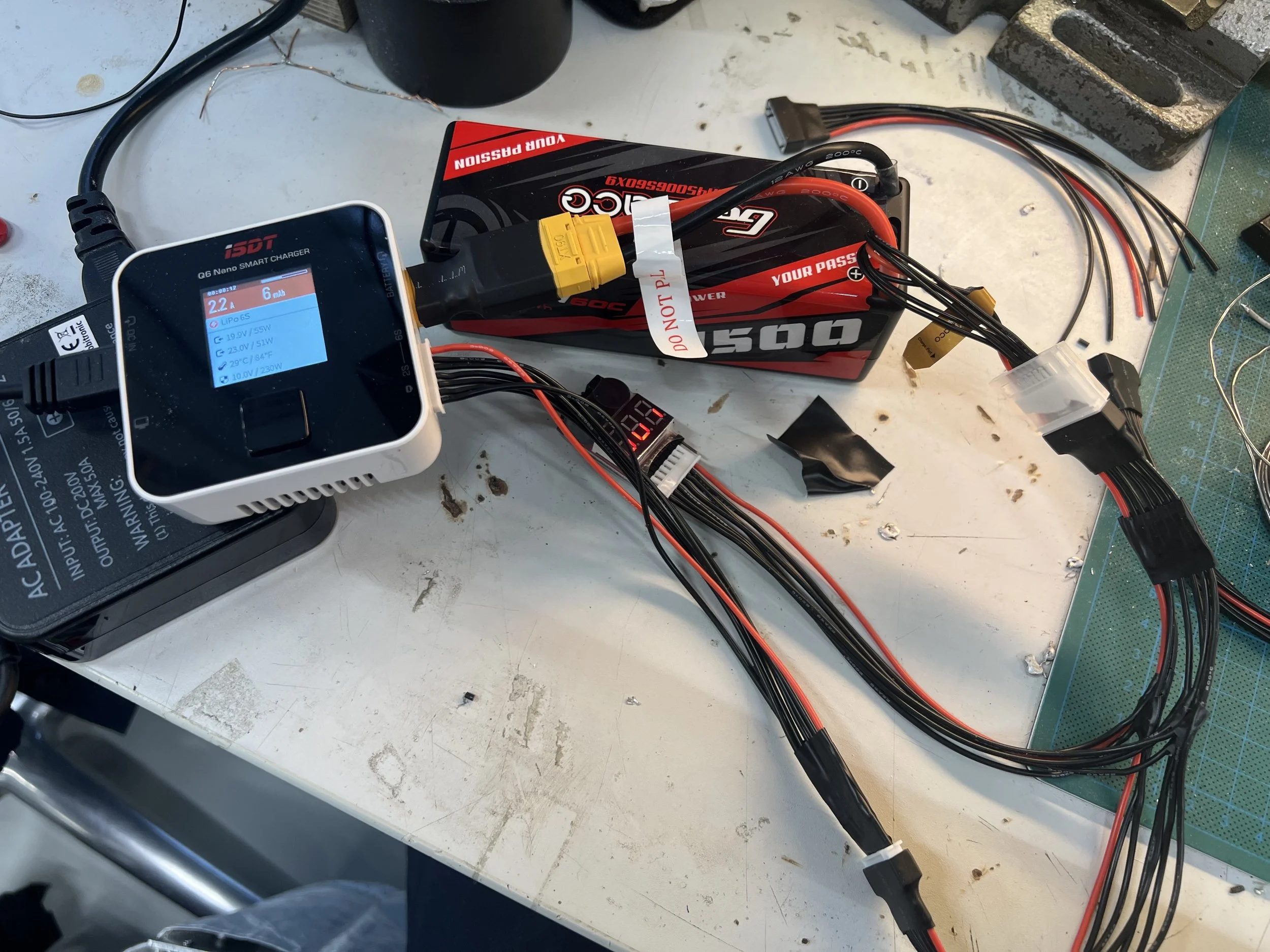 For better integration of the battery and charging. A custom wiring harness was created so the battery doesn't have to be removed for charging.