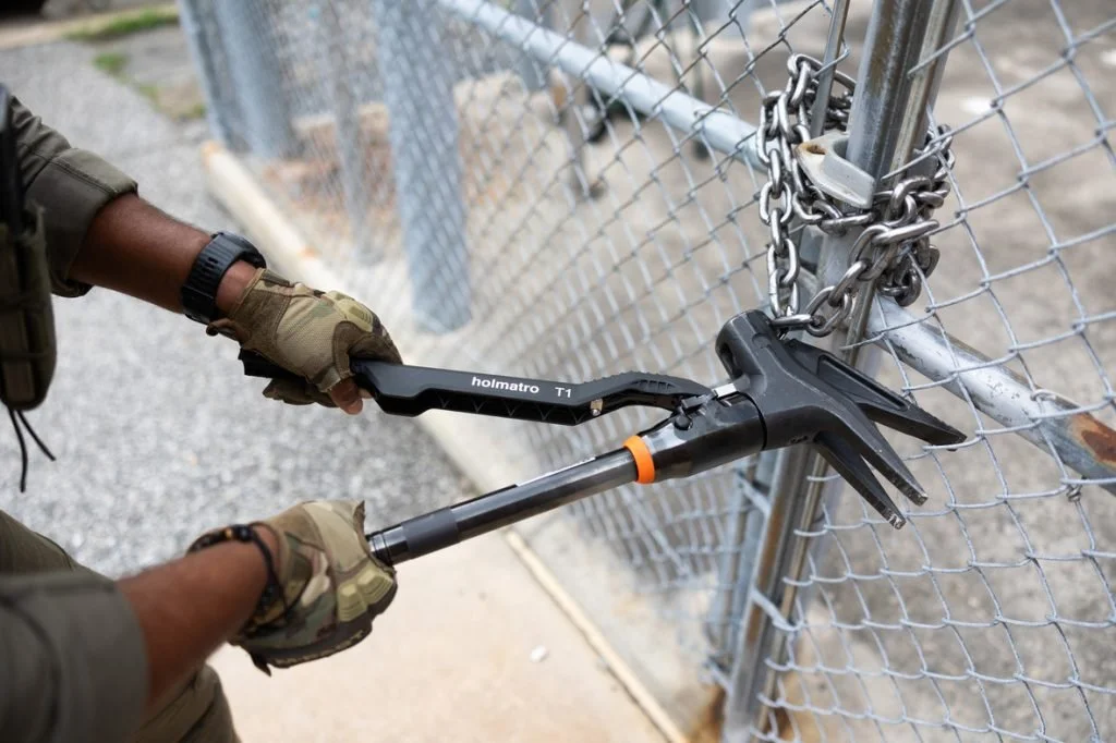 The Holmatro T1 is a handheld hydraulic forcible-entry tool combining cutting, spreading, ramming, wedging, hammering and lifting in one device. The task at hand was to analyze and redesign this tool for repair and recycling.