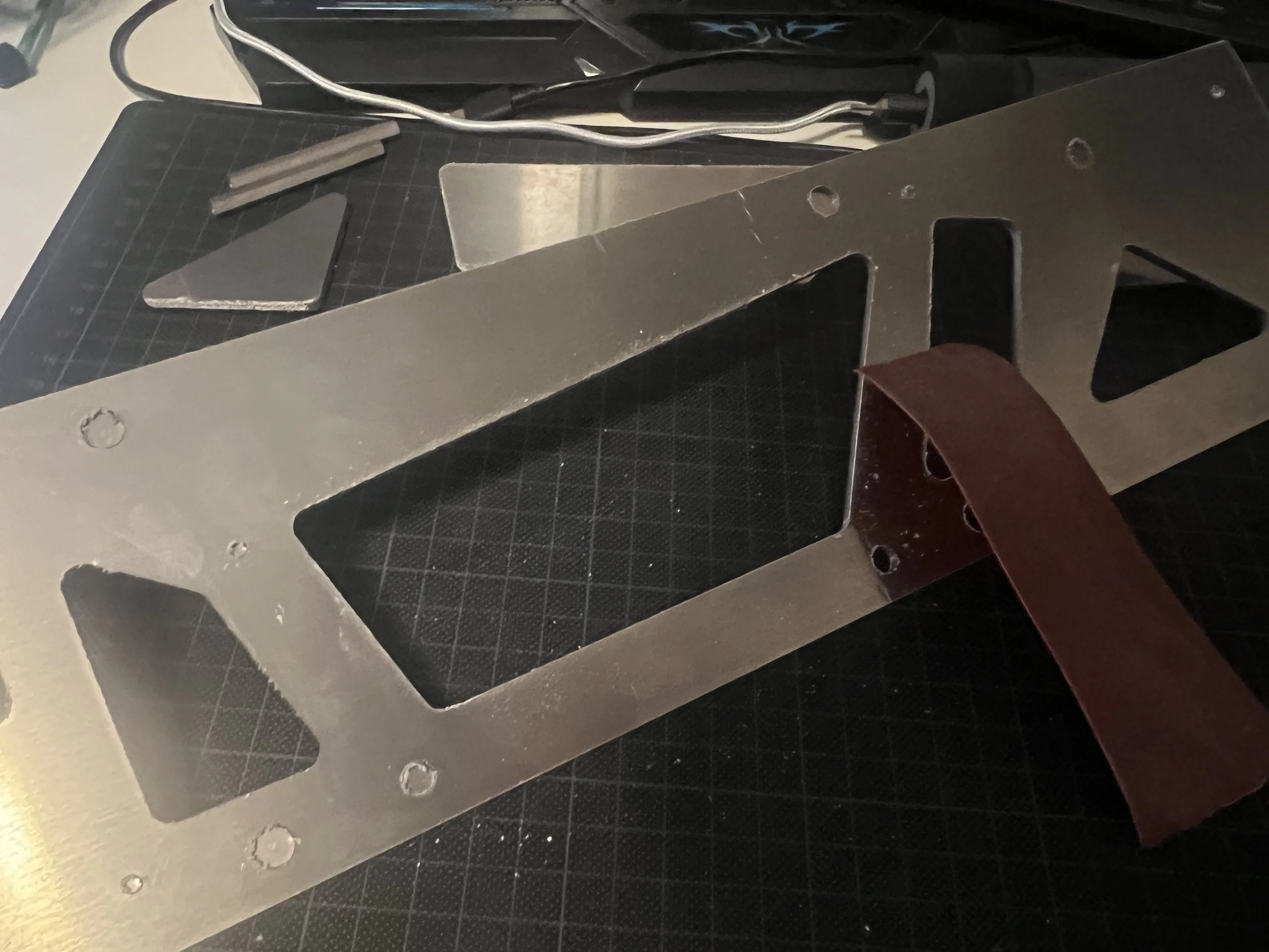 The aluminum material choice required some post-processing due to the aluminum spattering during laser-cutting.
