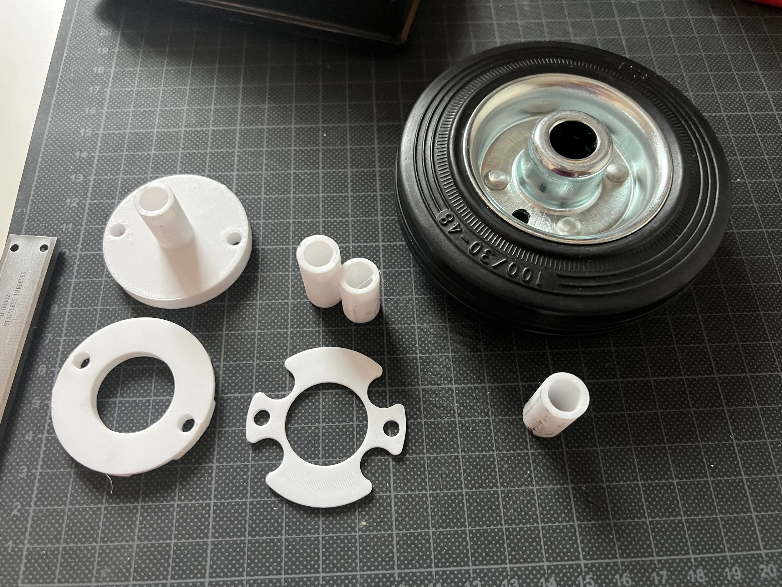 Due to an unforeseen part delivery failure, a new drive wheel type was acquired. This wheel had to be adapted for the design accordingly.