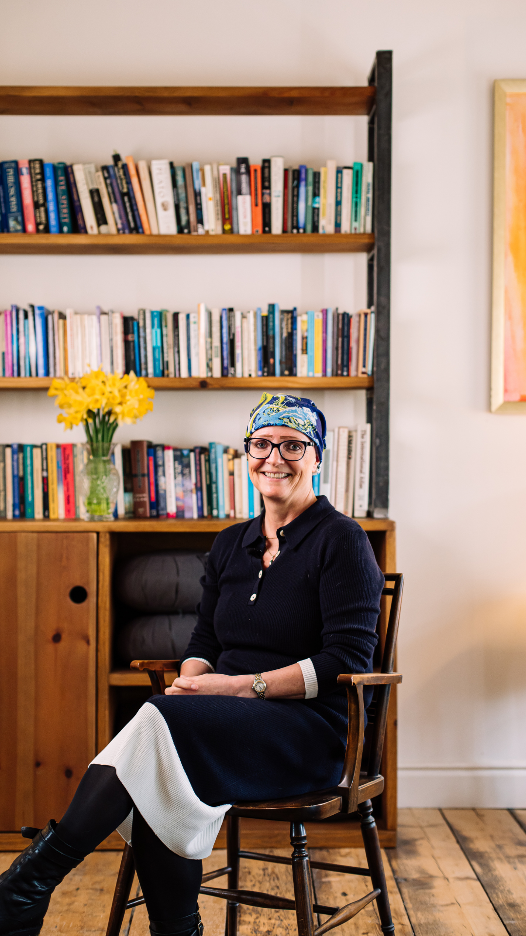 Jane sitting in a chair