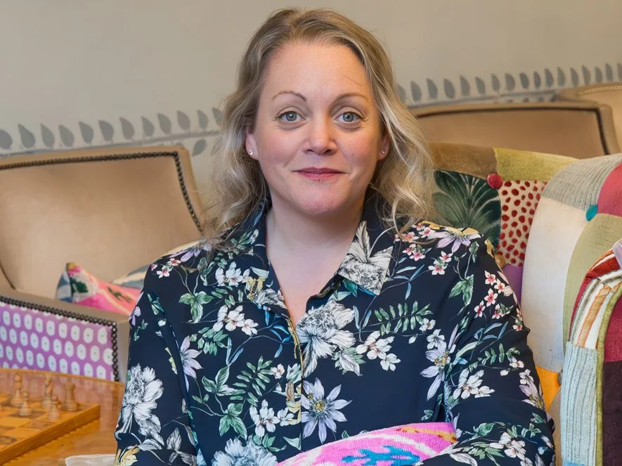 Amy, the CEO of Jaim, leading the family business mission to bring creative, screen-free play to homes. The 'A' in the JAIM family name.