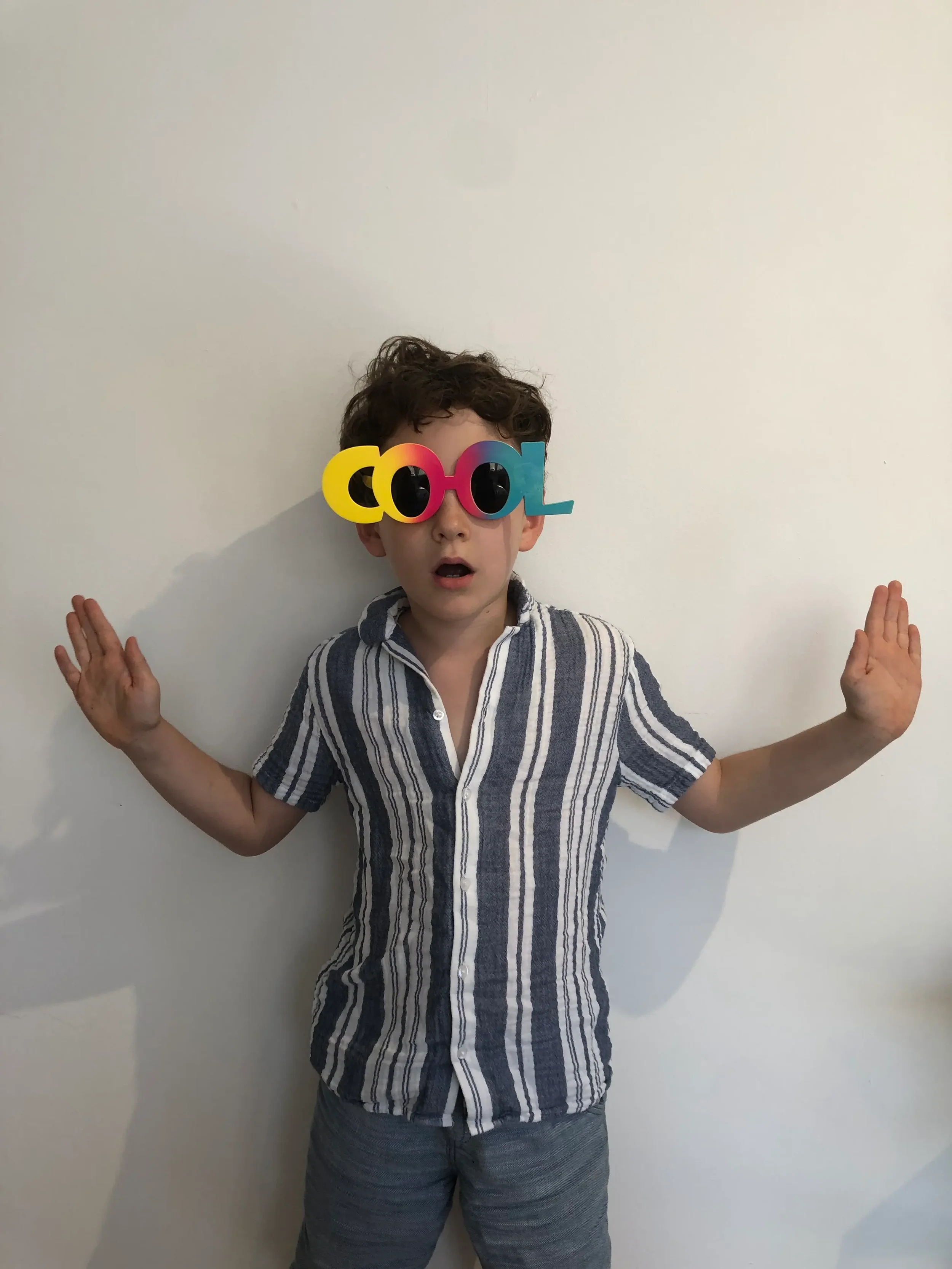 Magnus, the 8-year-old lead product tester and 'M' in the JAIM name, designing a custom pixel art pattern. The original inspiration for the Jaim lamp."