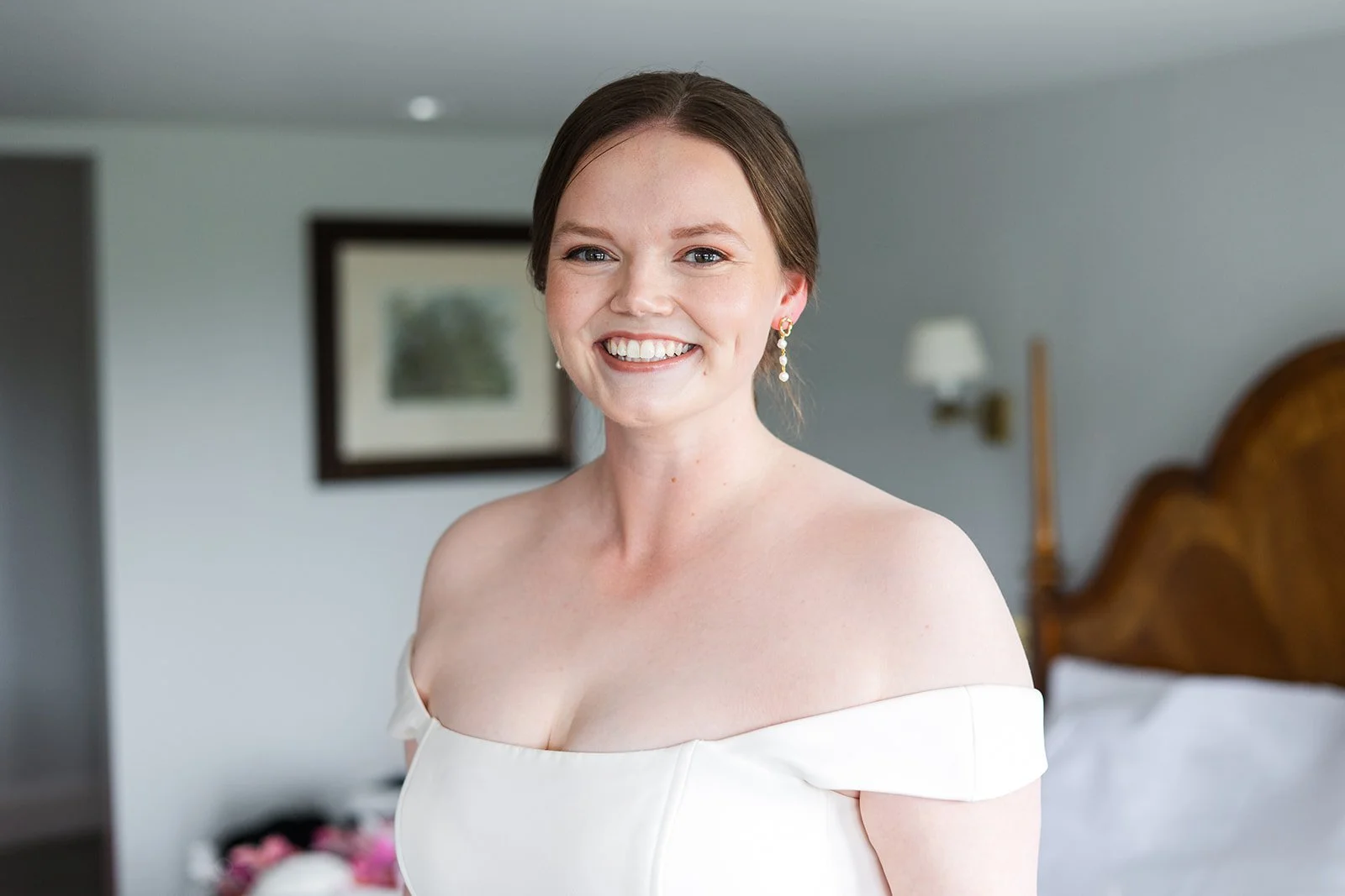 A bride wearing a natural makeup look for her wedding at Wivenhoe House Hotel in Colchester.