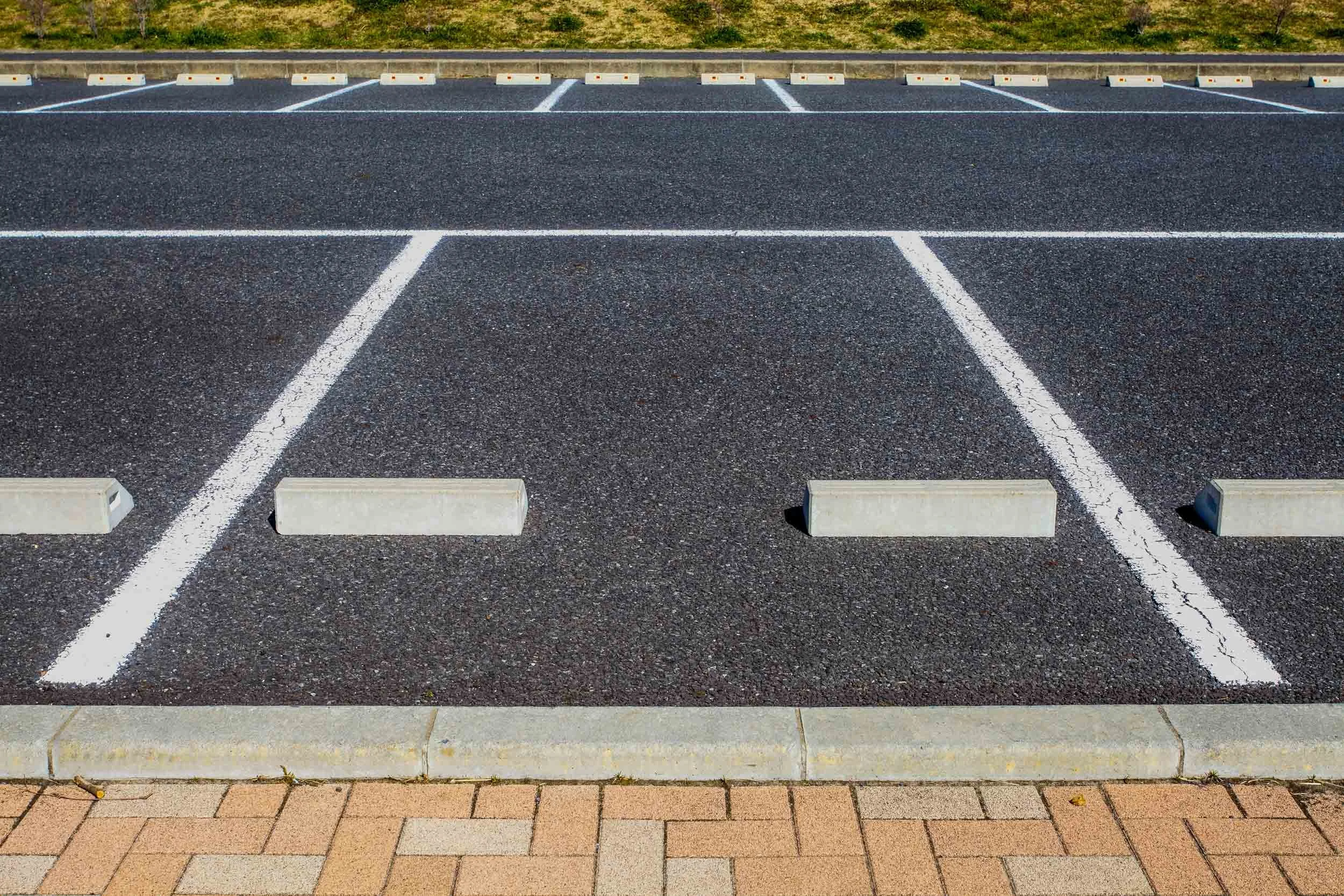 Cement Parking Blocks and Parking Lot Stripes