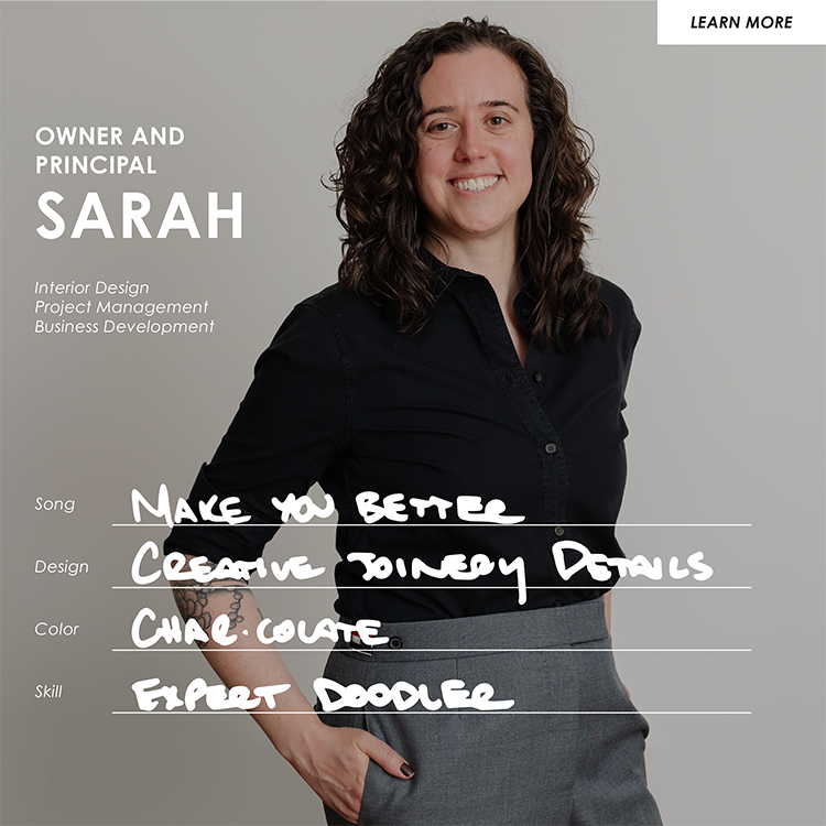 Professional portrait of Sarah, owner and principal of an interior design business, smiling and standing against a neutral background.