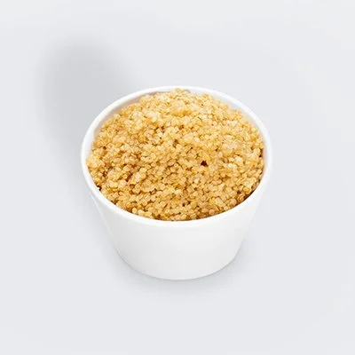 photo of a small white bowl filled with grains of cooked quinoans