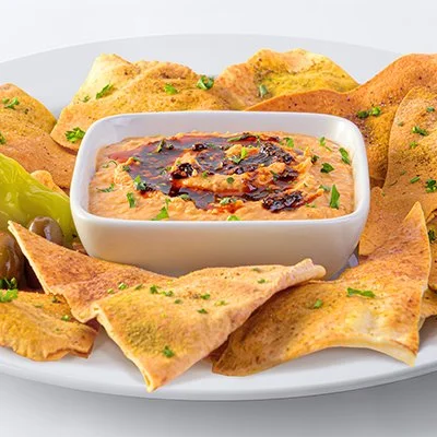 spicy harissa hummus with baked pita