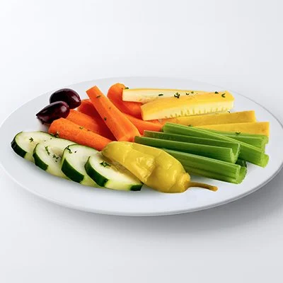 a photo of a white plate with sliced cucumbers, carrot sticks, celery sticks, and sticks of raw yellow squash accompanied by kalamata olives and a pepperoncini pepper