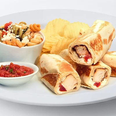 a photo of the grilled chicken roll-up from Taziki's with a side of pasta salad, potato chips, and a small dish of salsa