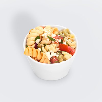 a photo of a small white dish filled with pasta salad