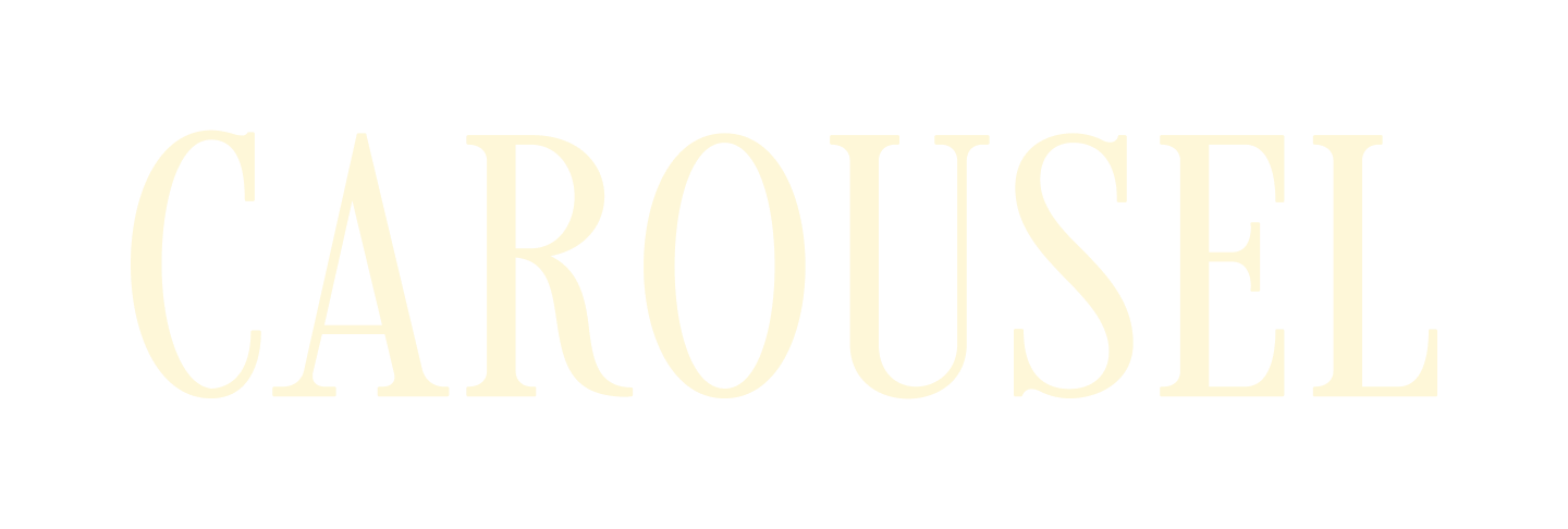 The word "CAROUSEL" in large, light-colored capital letters on a dark background.