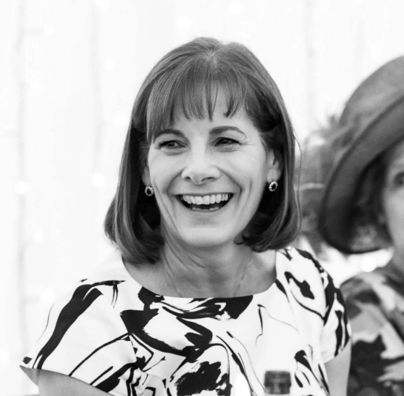 client smiling at a wedding happy black and white photo