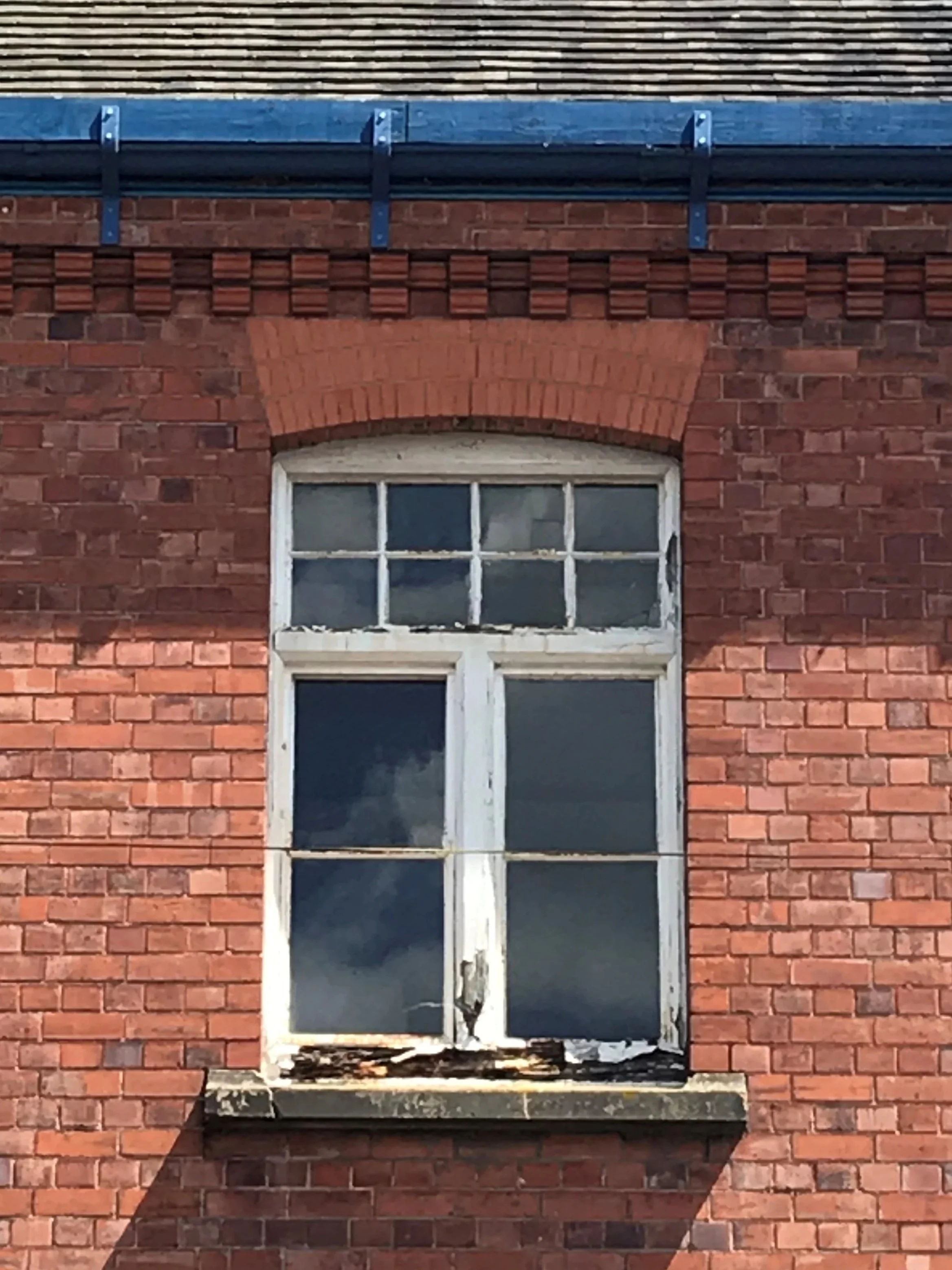 Decayed sash window to Coleham Pumping Station, Shrewsbury, photographed during a window condition survey that was used to detail the repair of windows.