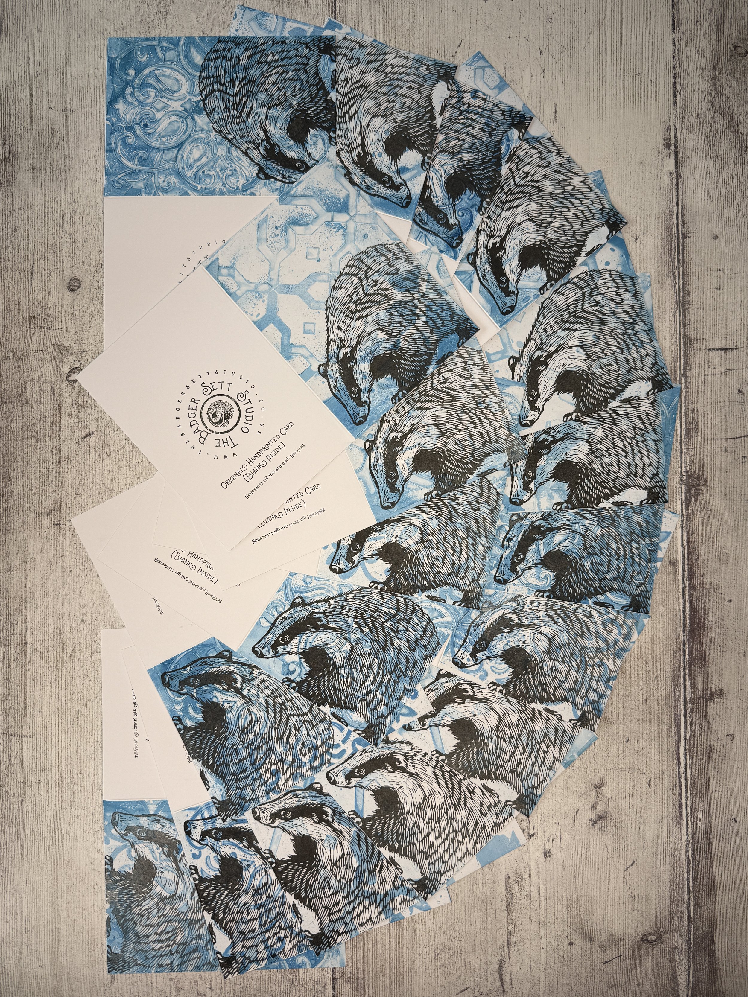 The Badger Sett Studio Handprinted Lino Print Badger Cards arranged in a fan shape.jpg