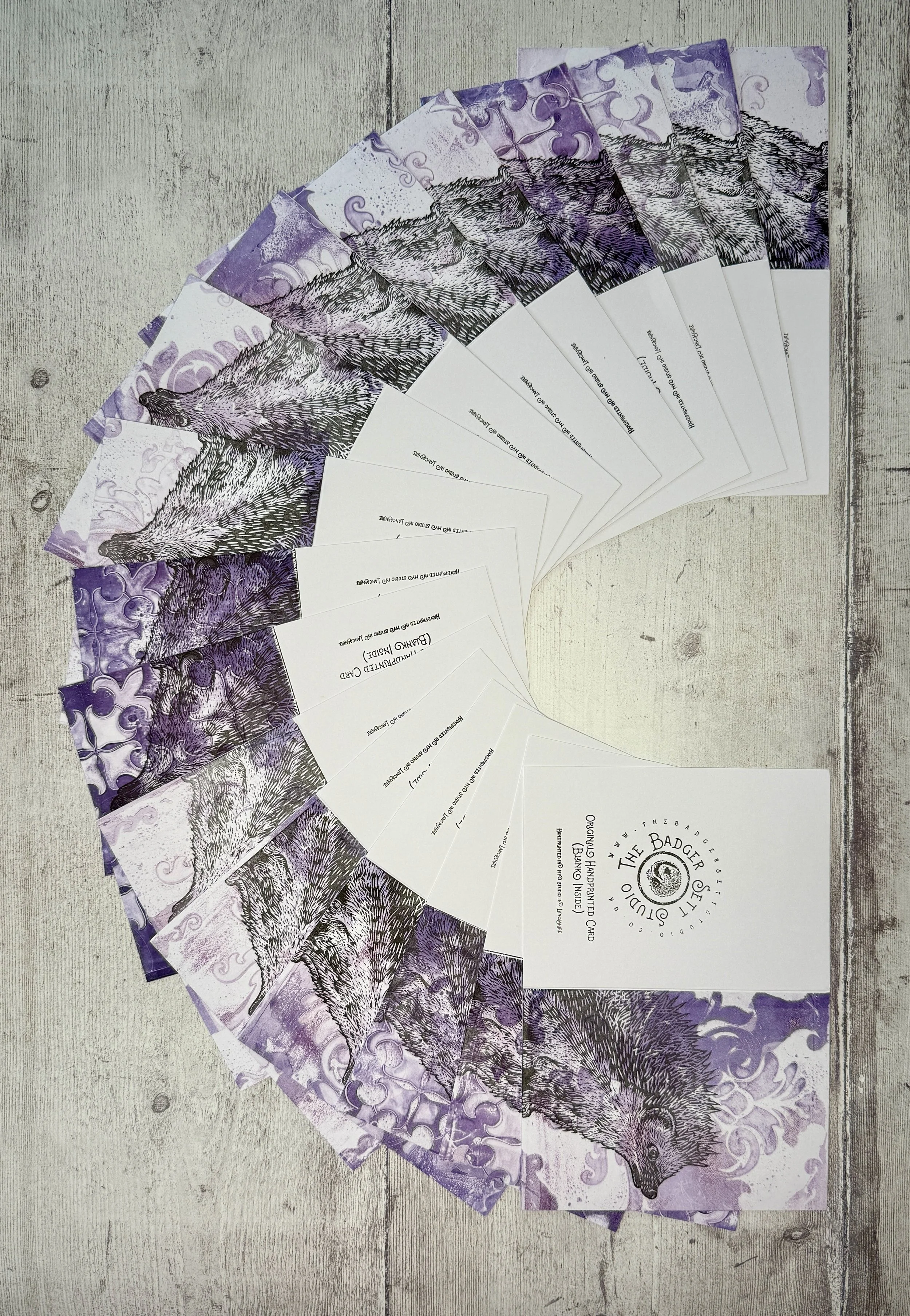 The Badger Sett Studio Handprinted Lino Print Hedgehog Cards arranged in a fan shape.jpg