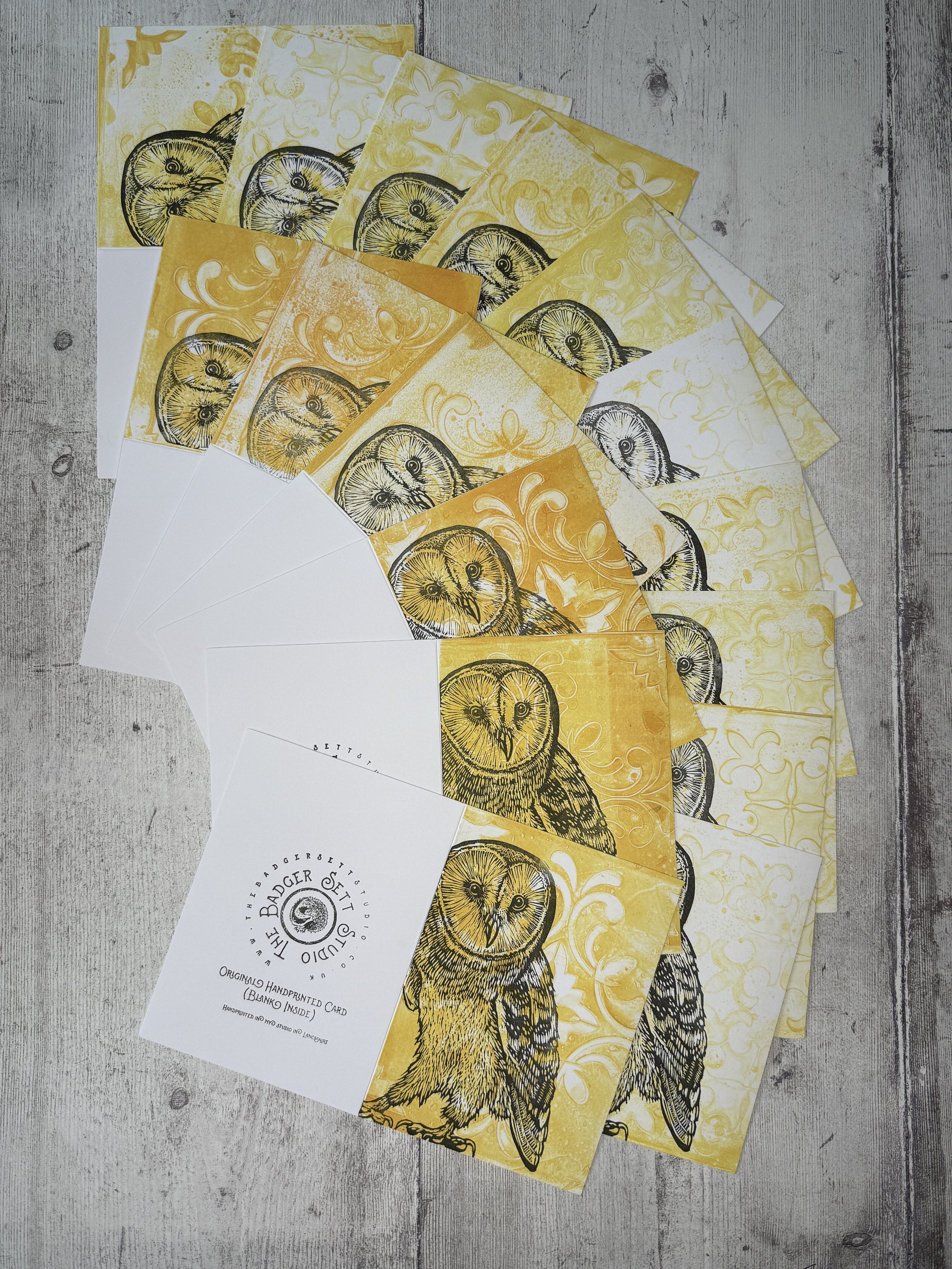 The Badger Sett Studio Handprinted Lino Print Barn Owl Cards arranged in a fan shape.jpg