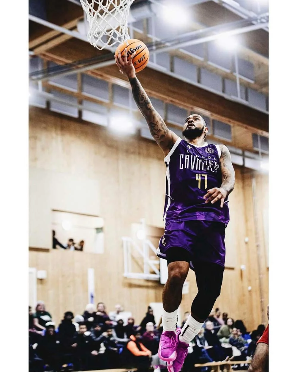 basketball-player-dunking-47-purple-uniform.jpg