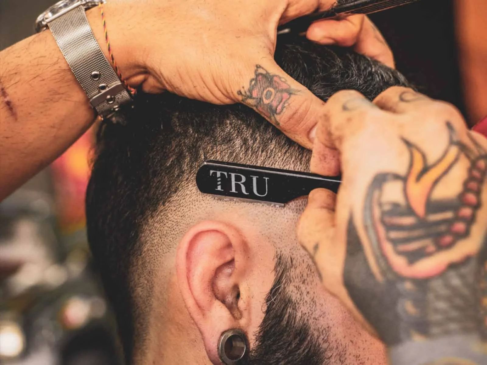 barber-cutting-hair-with-comb.jpg