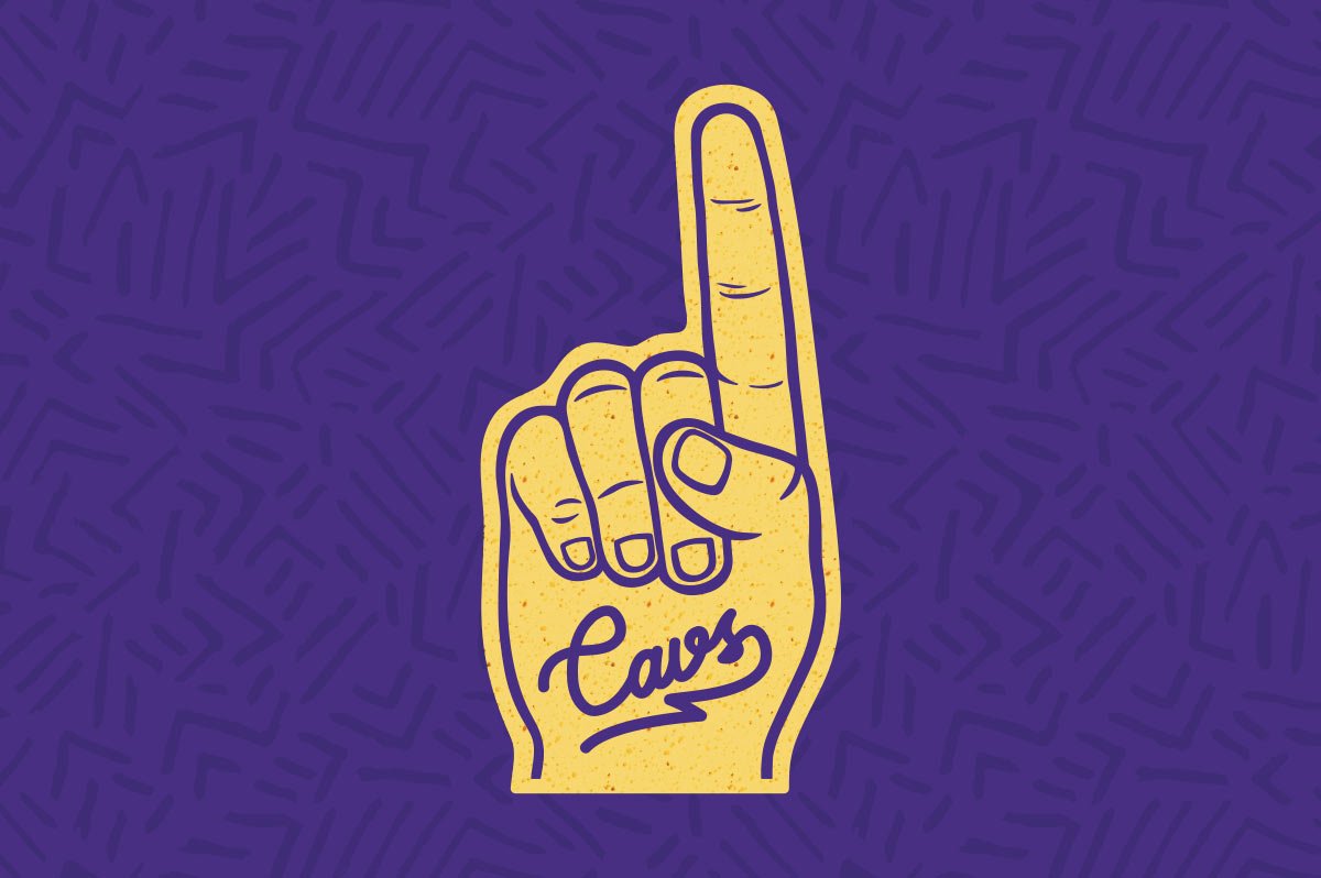 A yellow foam finger with "Cavs" written on it against a purple background.