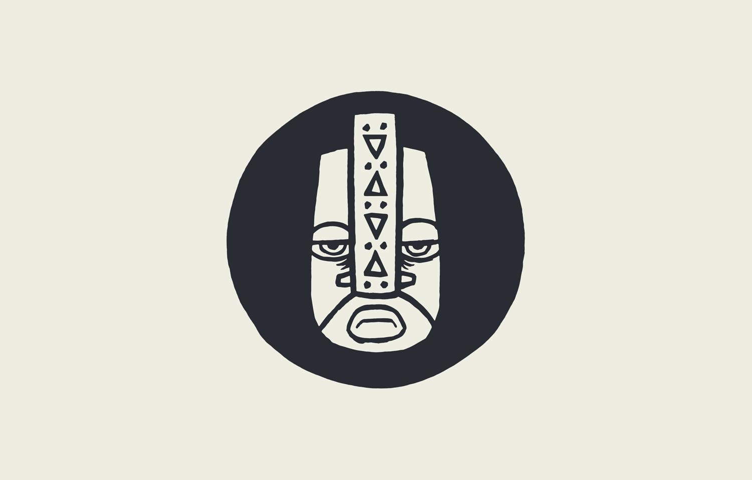 Mohican Sun logo. A stylised, tribal mask icon in black and white.