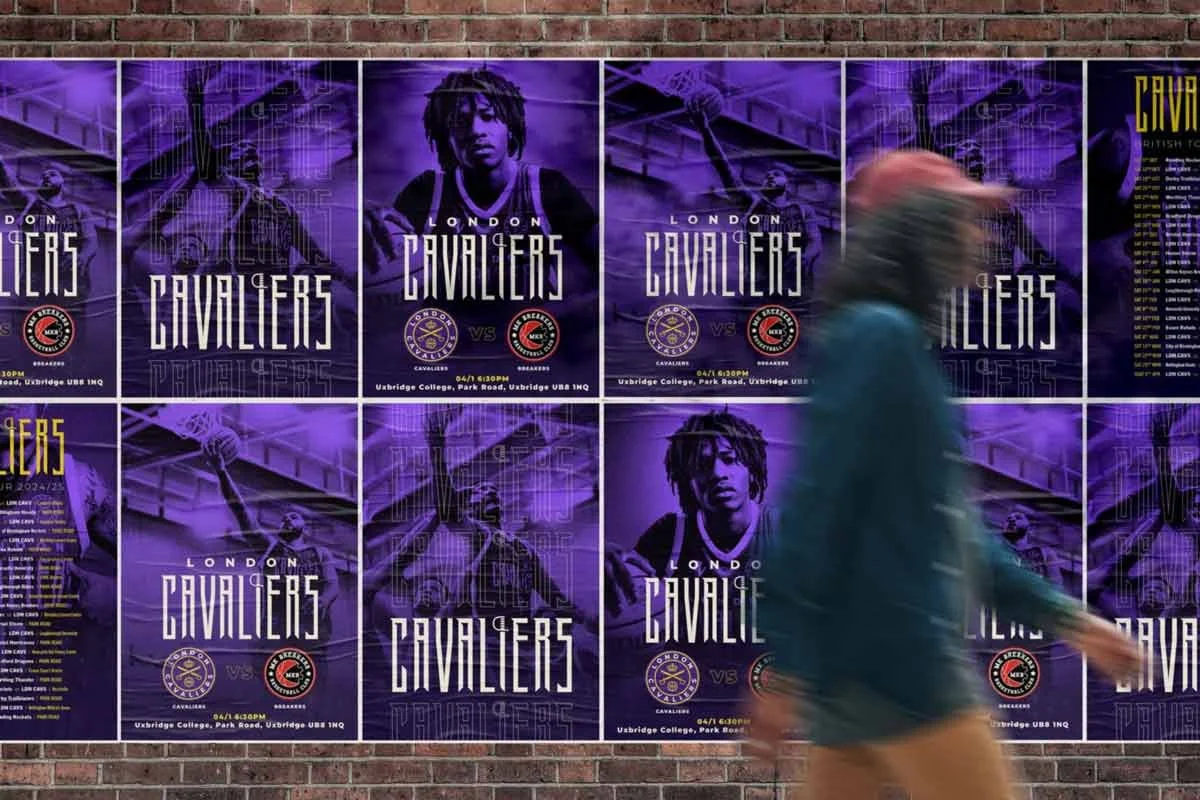 Multiple London Cavaliers basketball posters are displayed on a brick wall with a blurred person in the foreground.