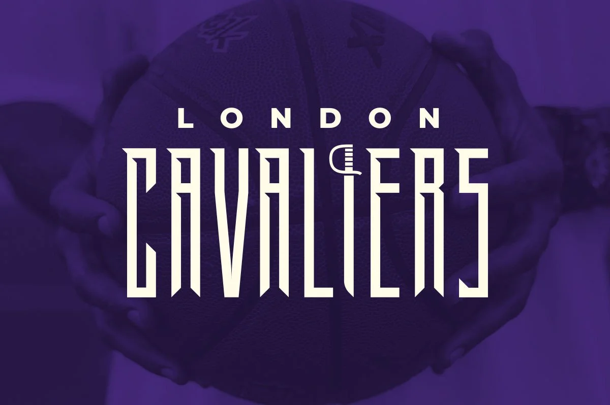 Hands hold a basketball with the London Cavaliers logo superimposed.