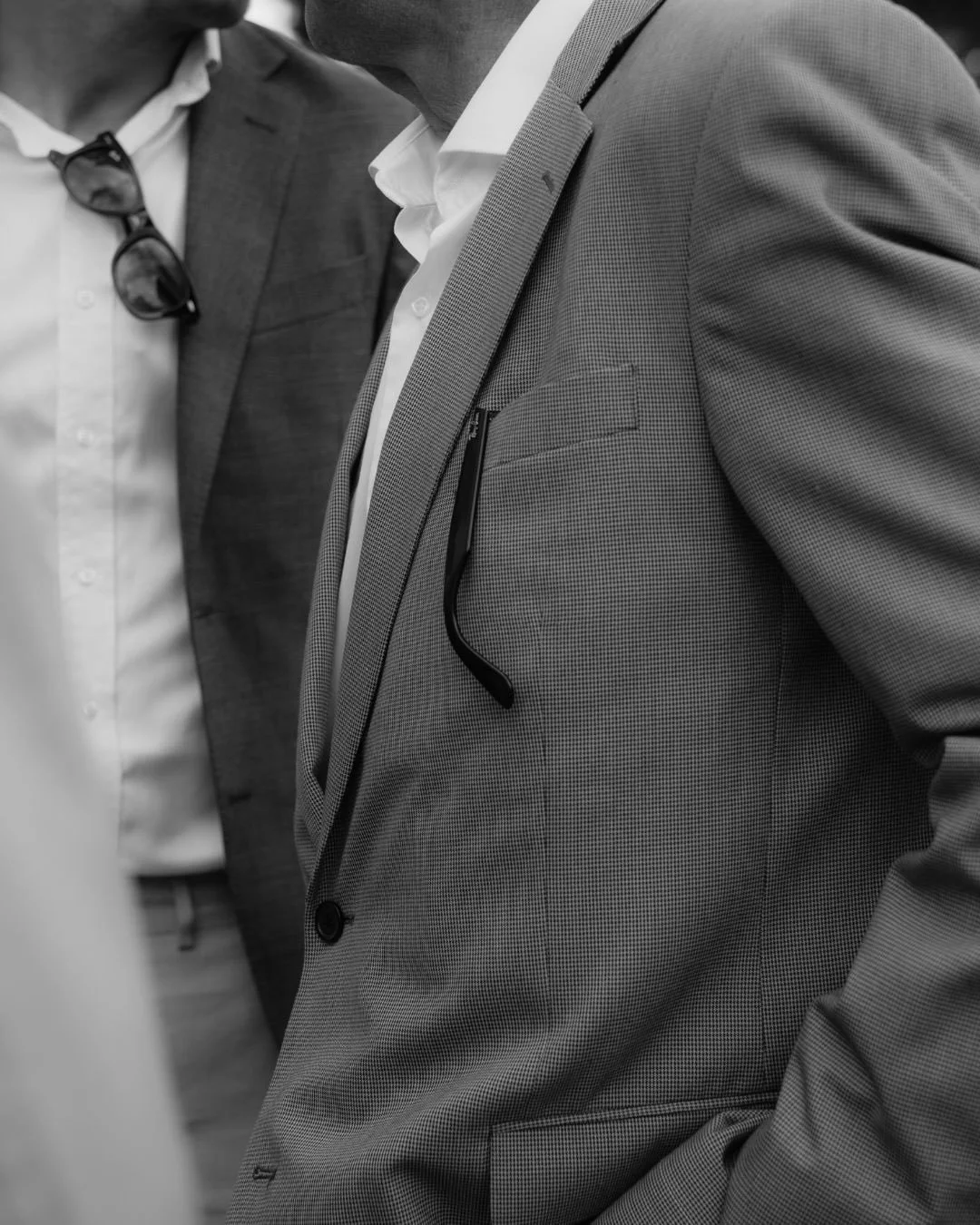 A couple of my recent fave black and white closeups. I love how something as simple as crossed legs sitting at a table or the sun shimmering off a pair of sun glasses can become art.