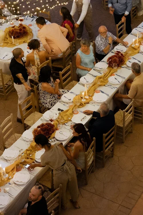 Aerial view of an outdoor evening wedding reception with fairy lights in Malaga