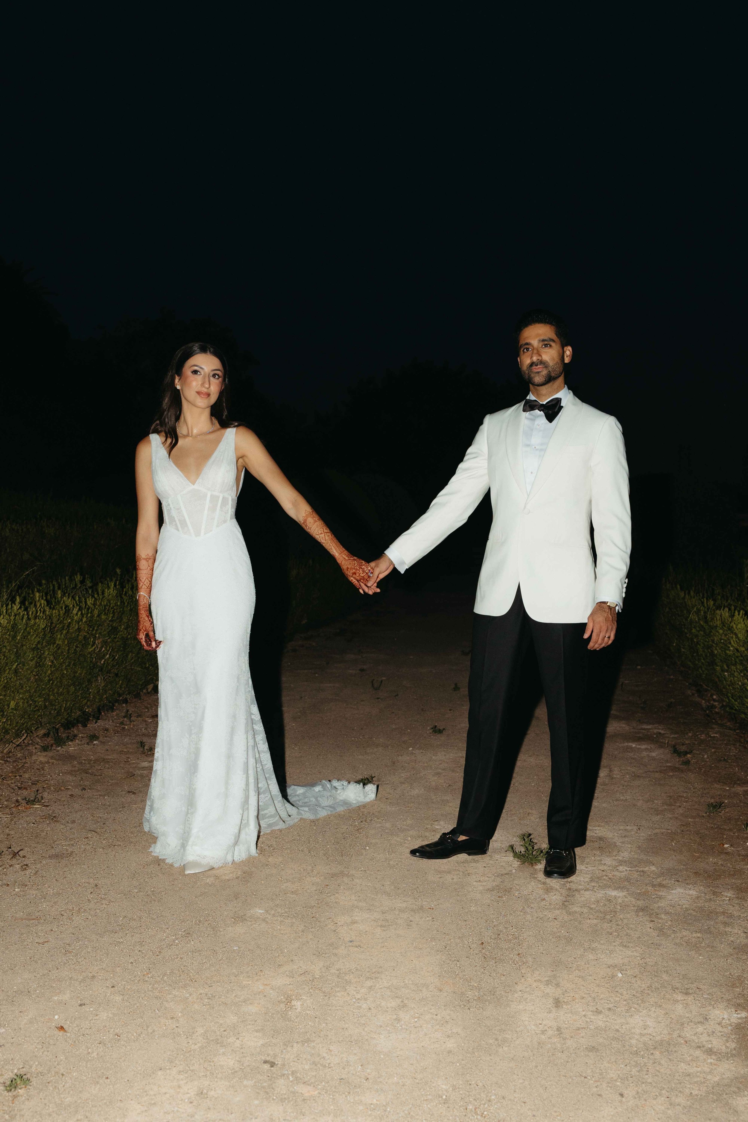 Bride and groom in formal outfits at Marbella wedding reception