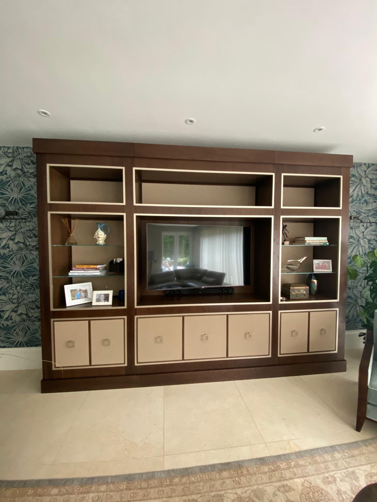 Bespoke Joinery. Medium smoked oak with shagreen panels, backlit LED panels and hand gilded handles and inlays.