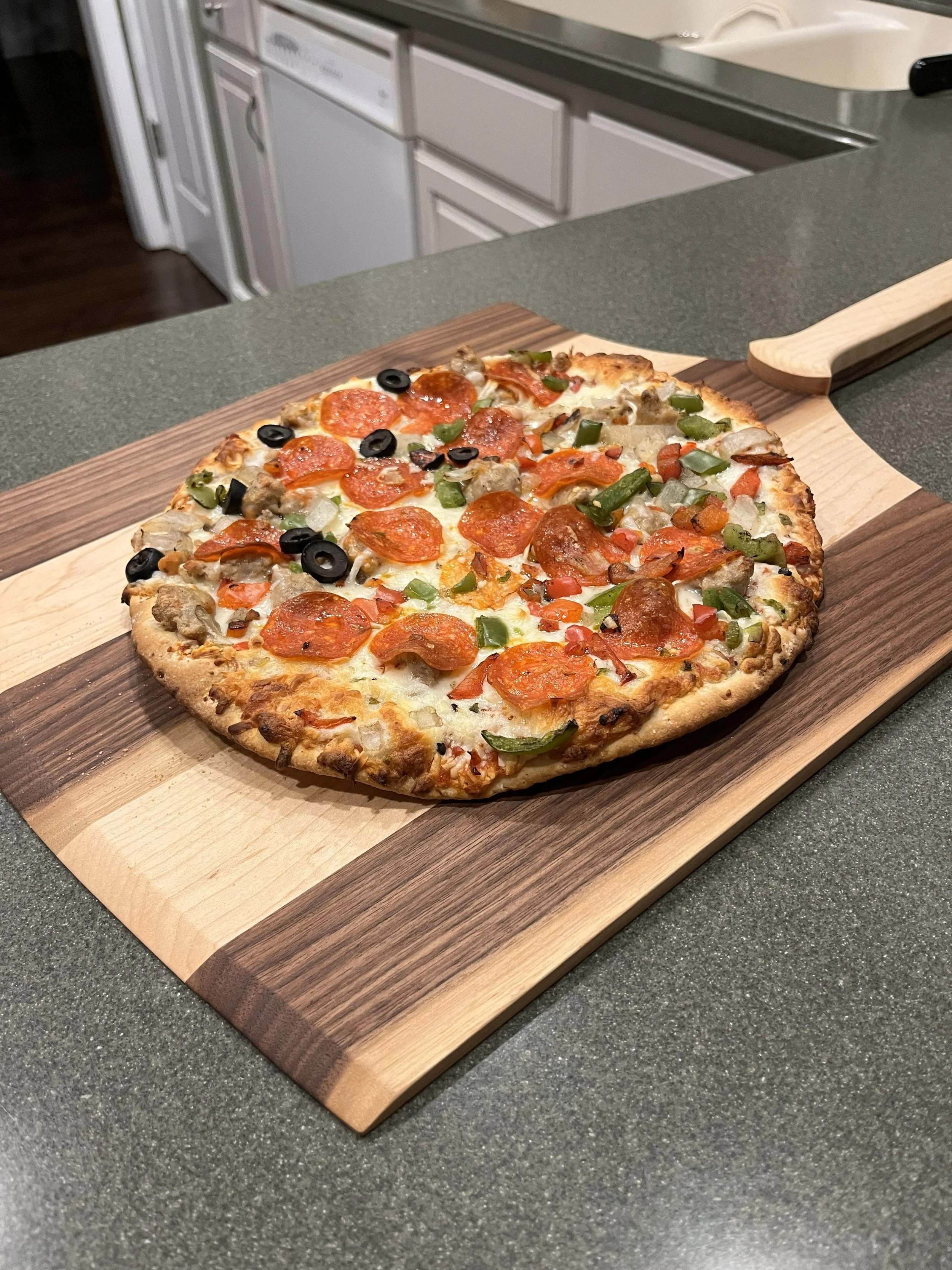 A handy thing to have for getting those hot pizzas out of the oven!