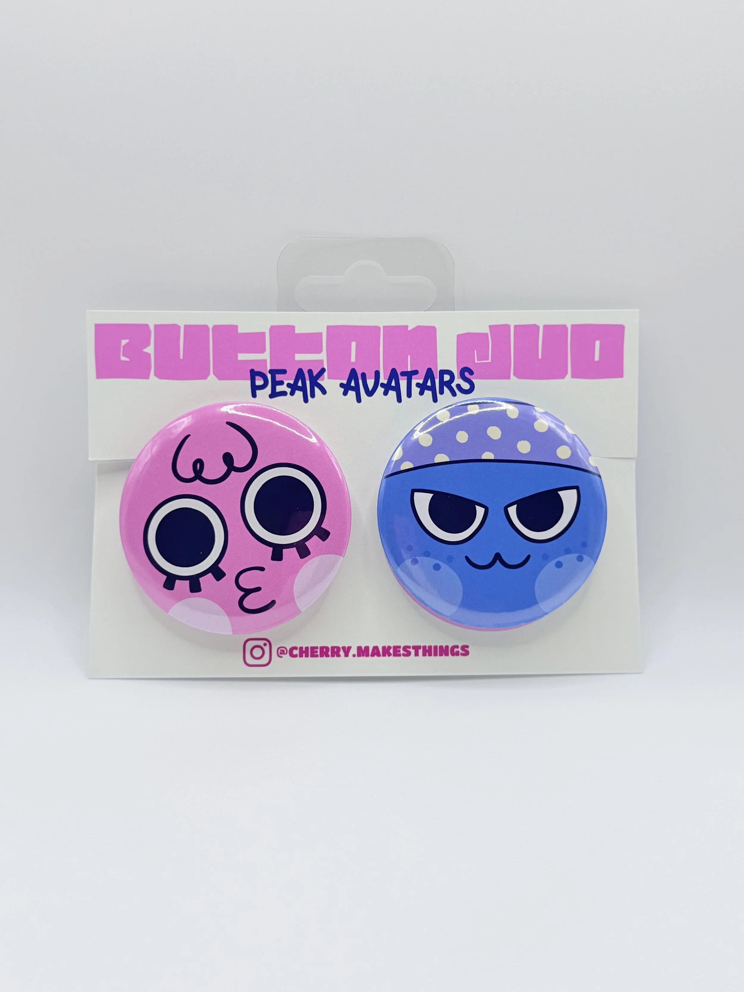 PEAK button badge duo