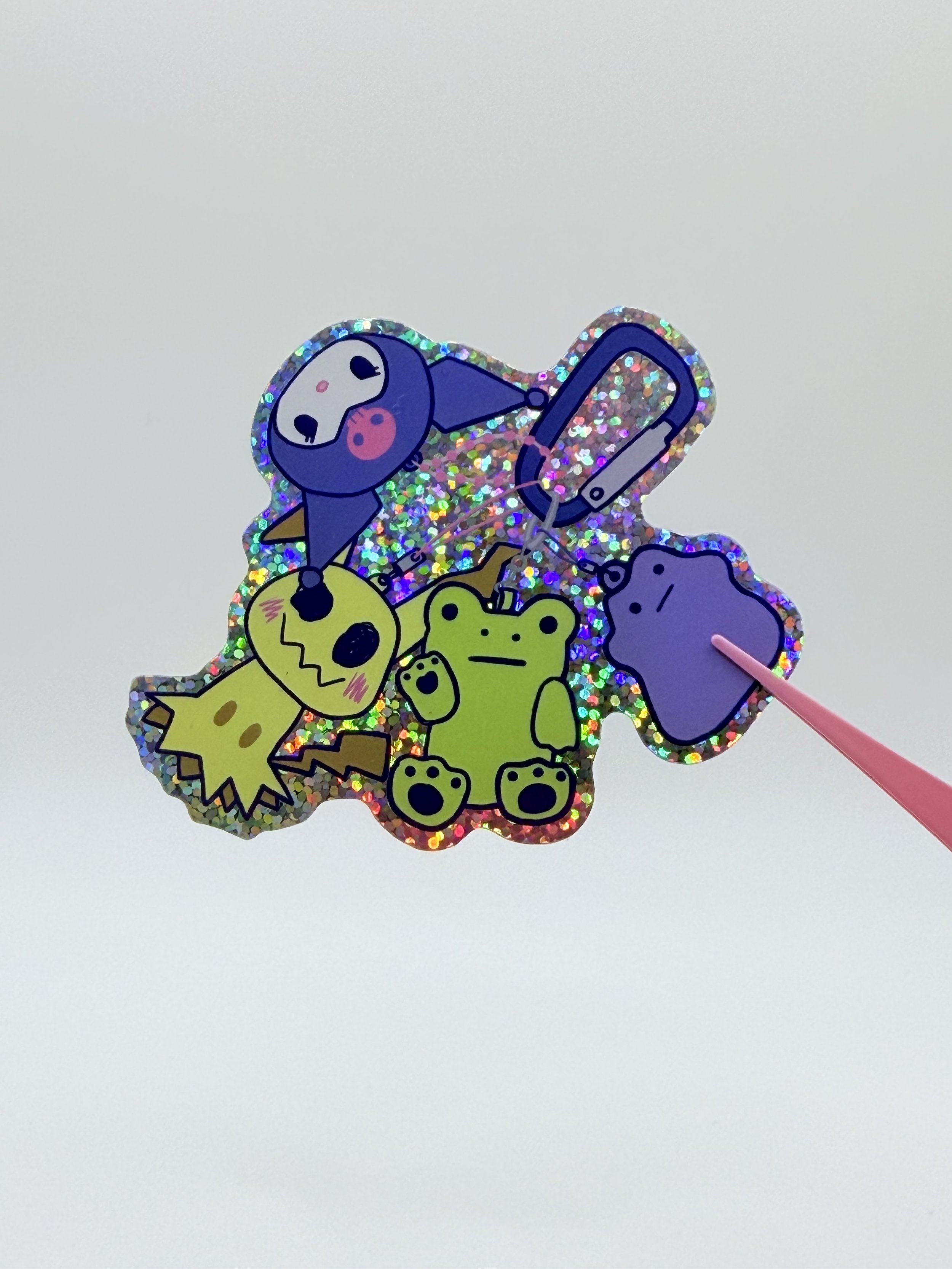 trinkets holo sticker
