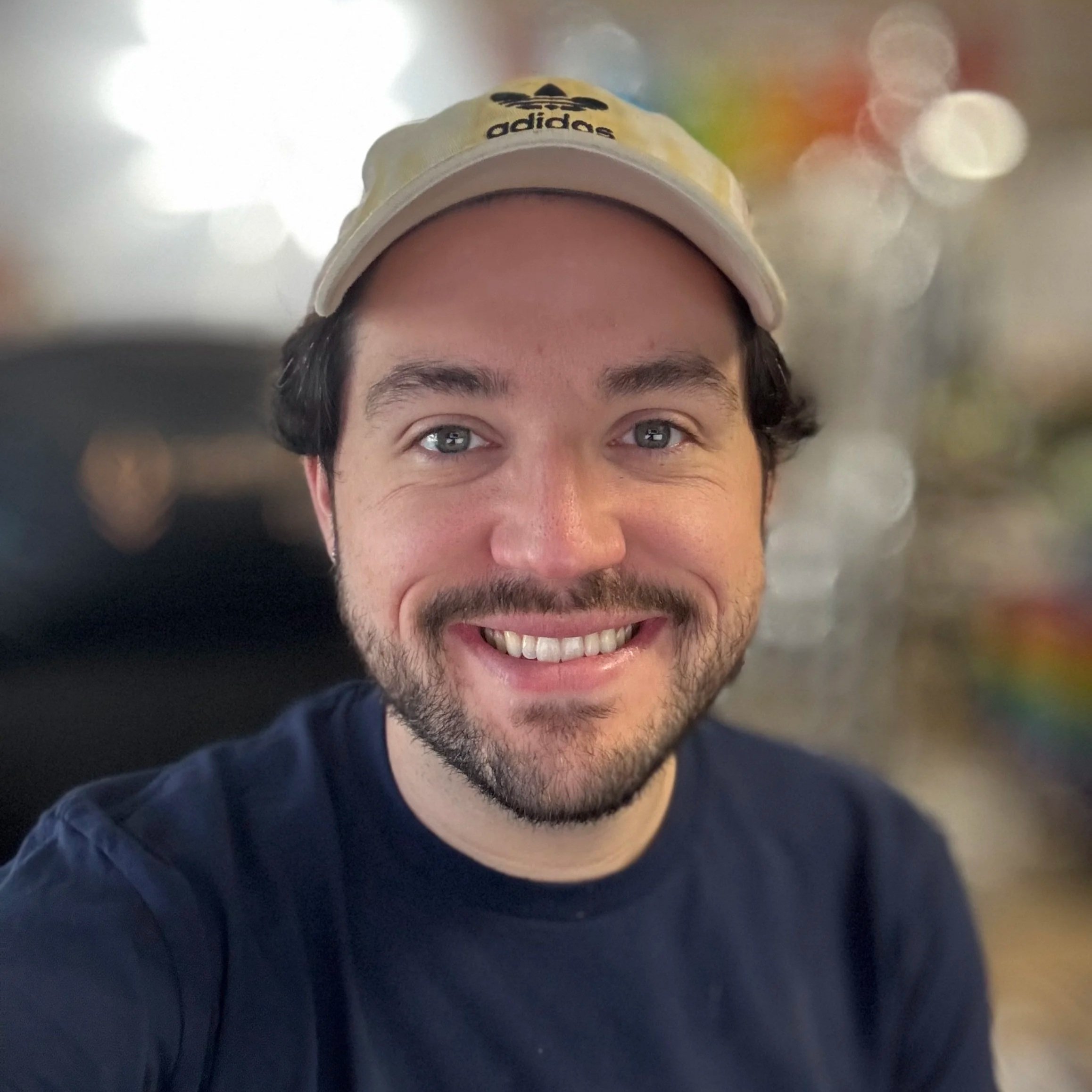 image of artist smiling at camera