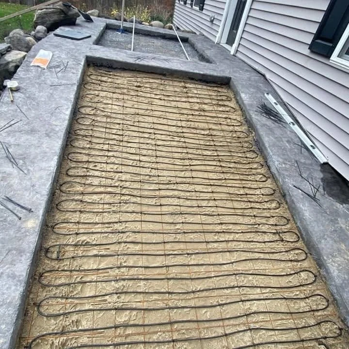 Did you know we install heated patios and walkways?

Heating systems can be installed underneath patios and walkways to help melt snow and ice when winter weather arrives. Less shoveling and safer surfaces all winter long! ❄️
