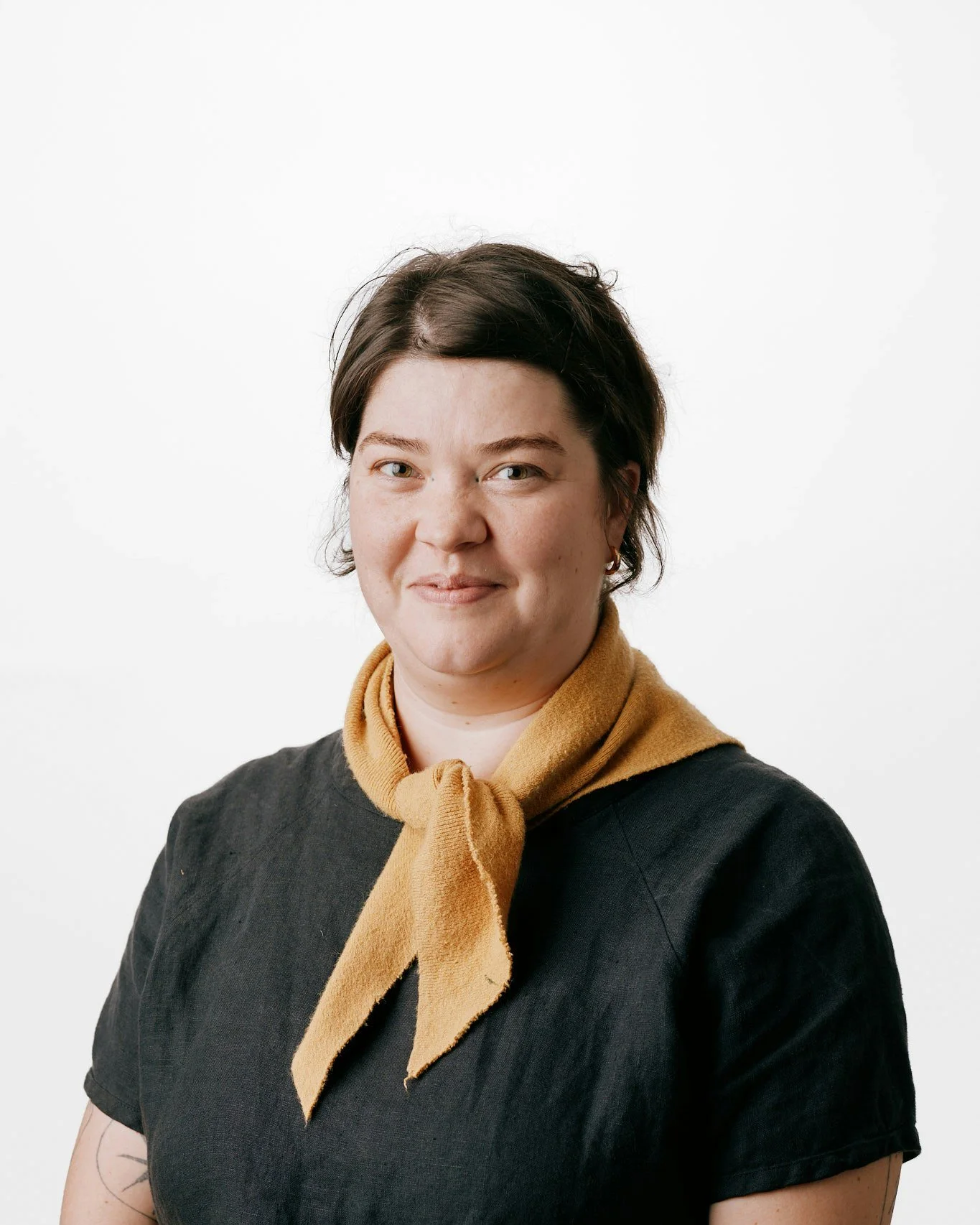 Meet Fern, a part of our Marketing, Volunteer and Curation committees!

Fern Tallos (they/them) is a self-taught visual artist working and living in Olympia. They are a freelance muralist and their studio practice explores smaller works on canvas and