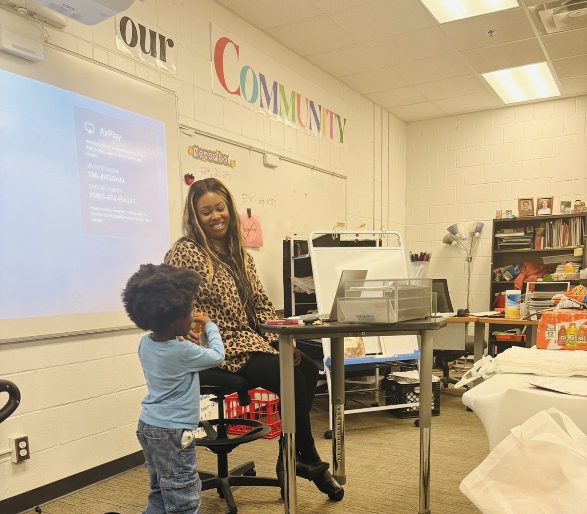 A classroom with a whiteboard, colorful 