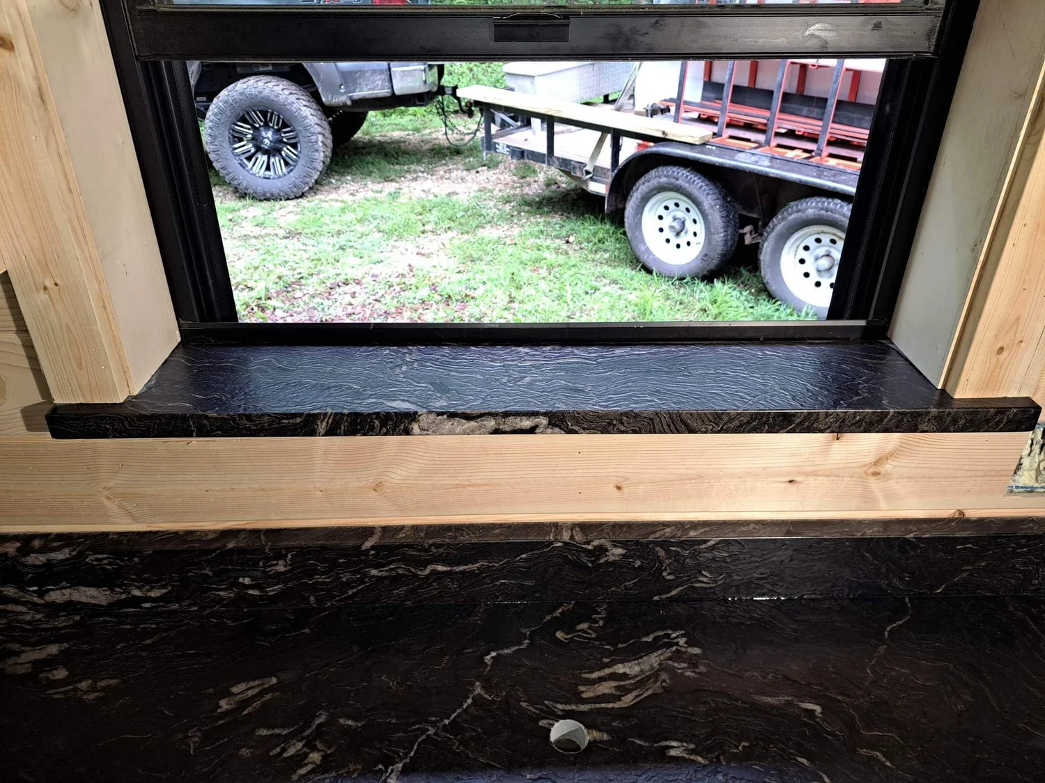 Blue-toned stone bar top installed on a custom base