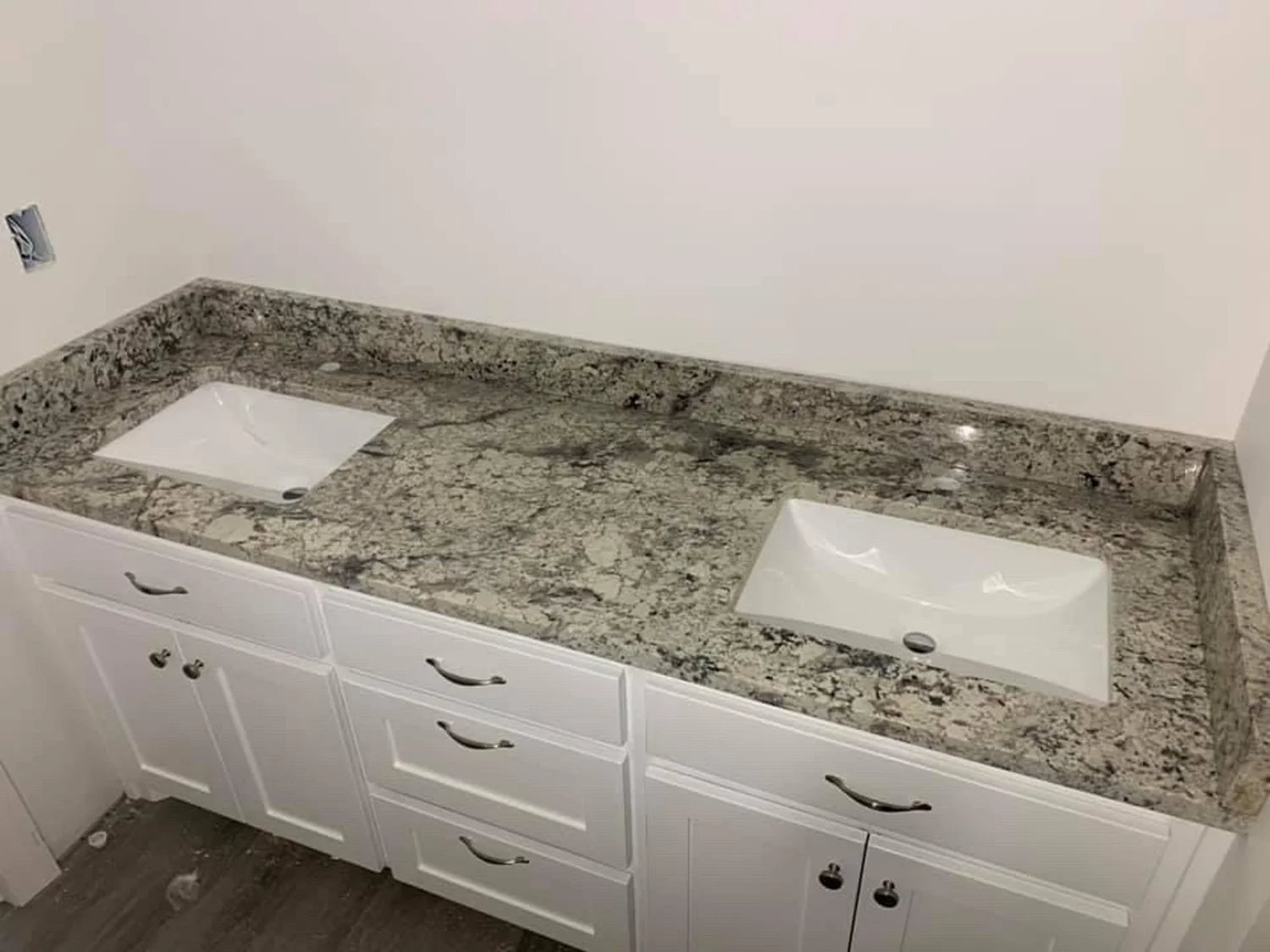 White stone double vanity top with two undermount sinks