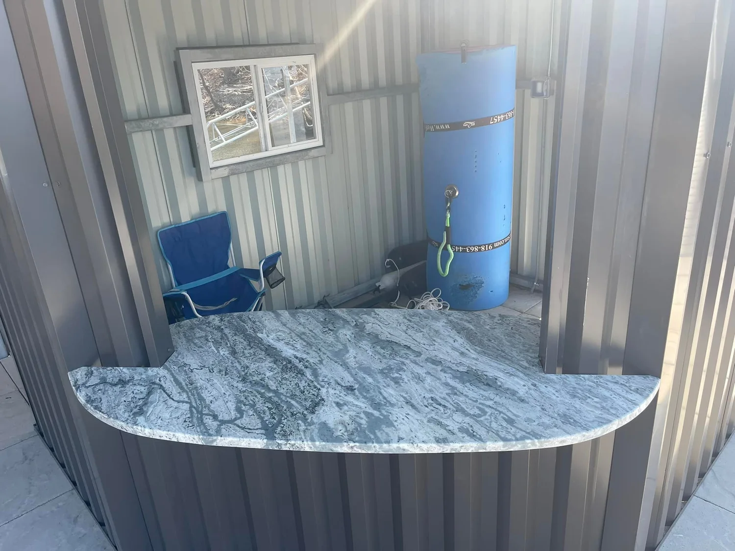 Stone slab being cut and finished in the Stone Restore Solutions fabrication shop