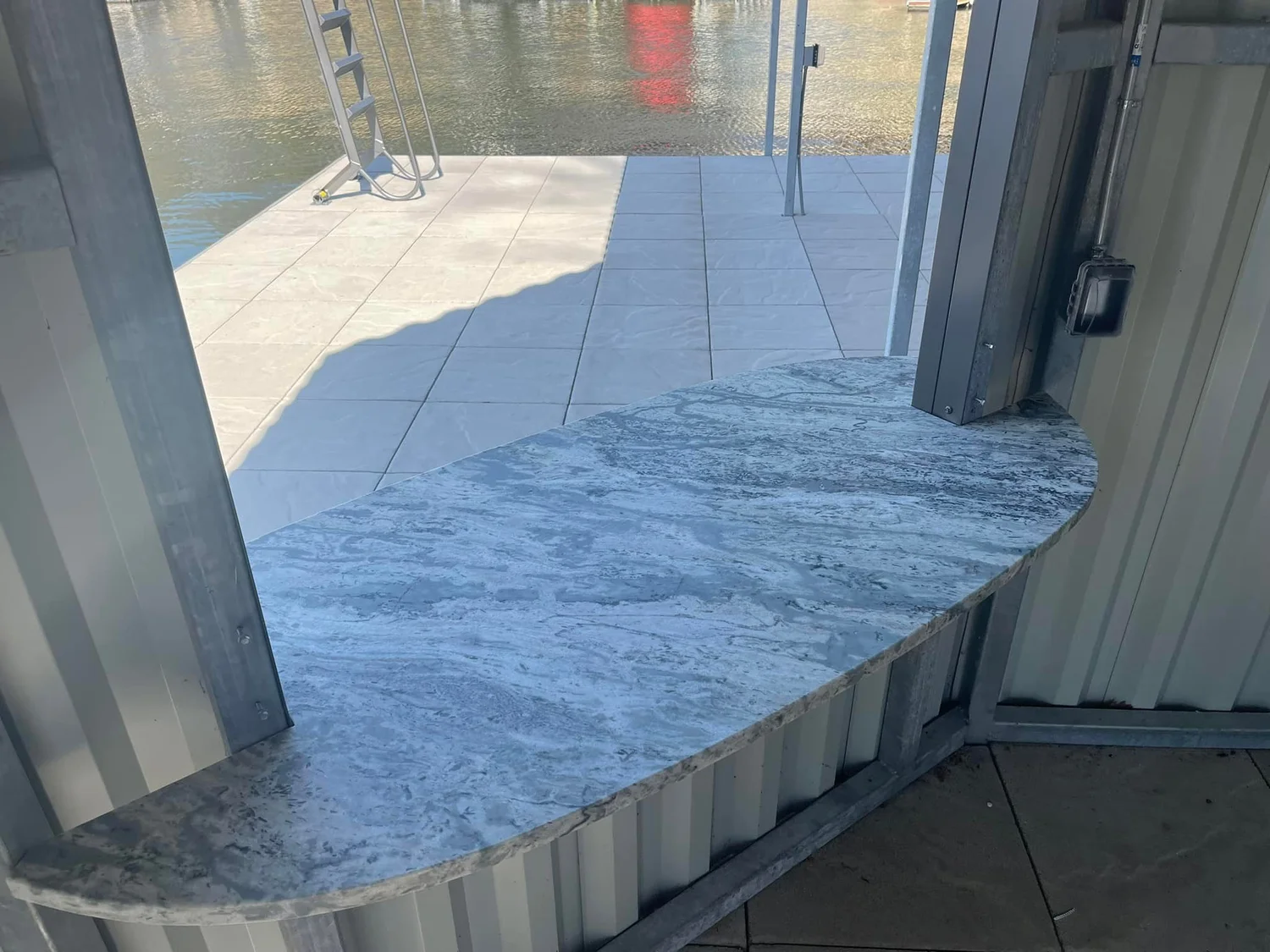 Natural stone patio surface laid outside a home