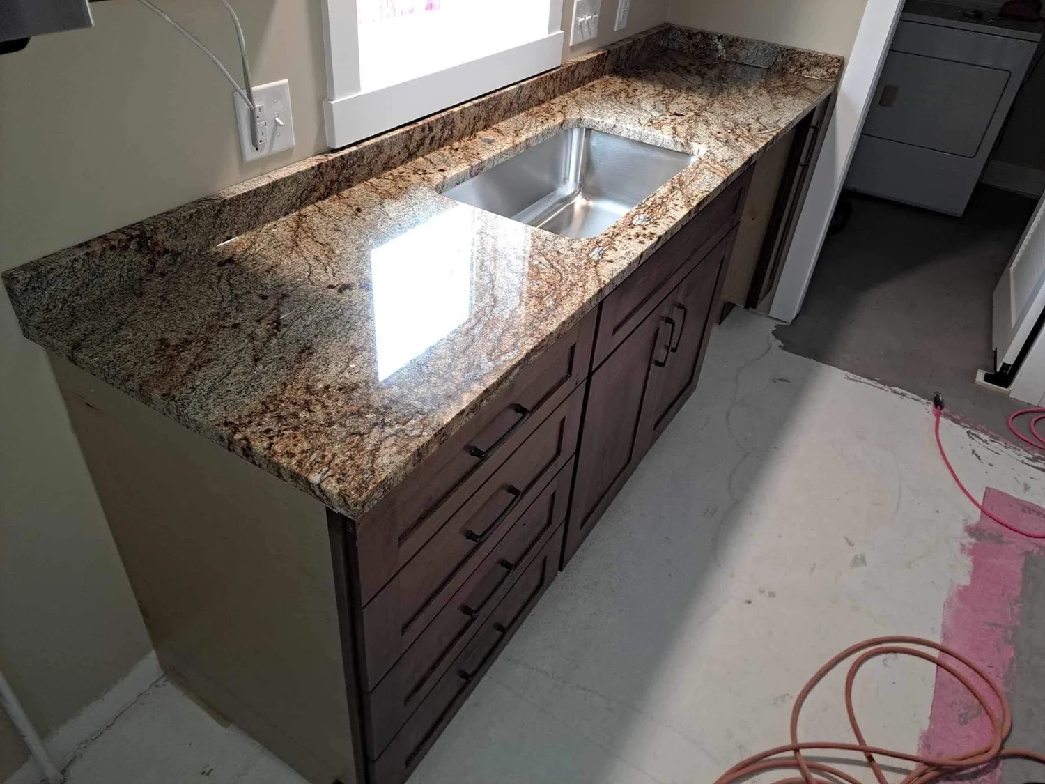 Granite double vanity top with two sink cutouts, ready for fixtures