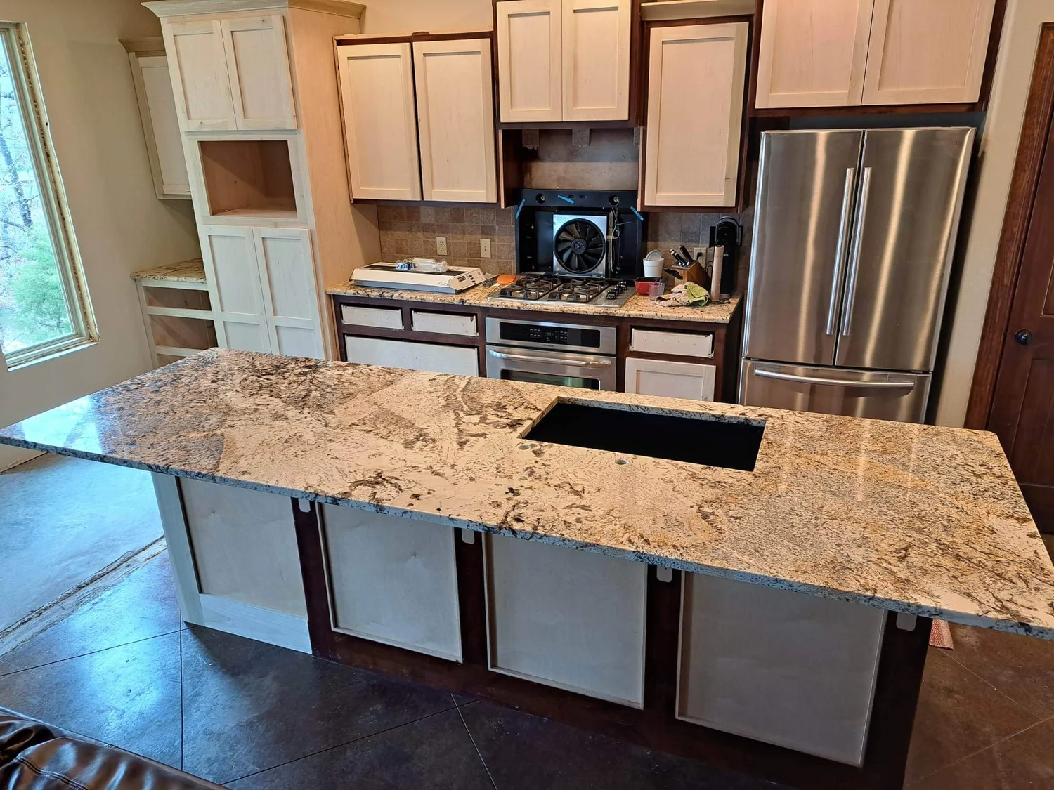 Teal stone bar top with a polished eased edge