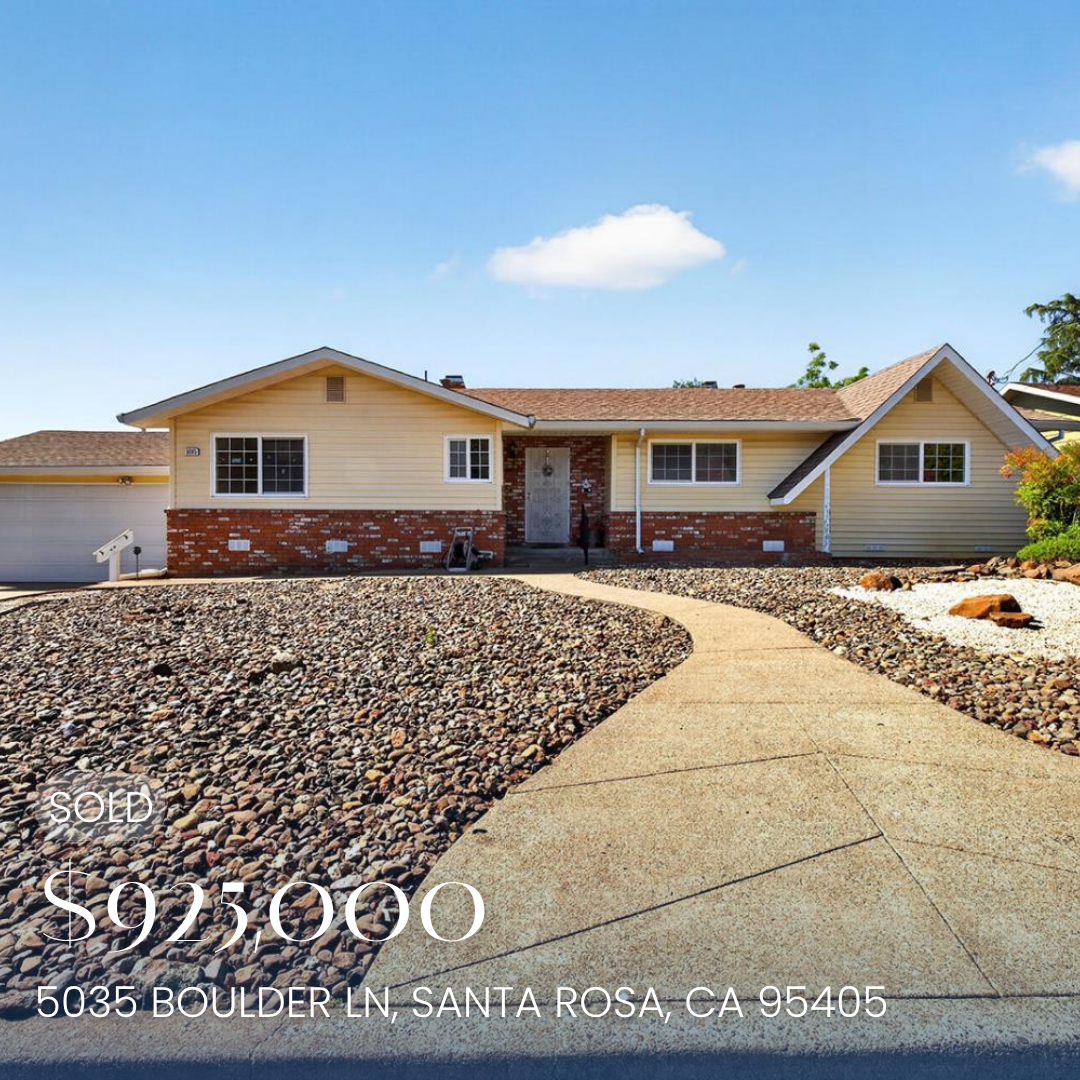 Exterior view of a house with yellow siding and brick foundation, a gravel yard, and a curved concrete walkway, with an overlay indicating the property is under contract for $930,000 at 5035 Boulder Lane, Santa Rosa, California.