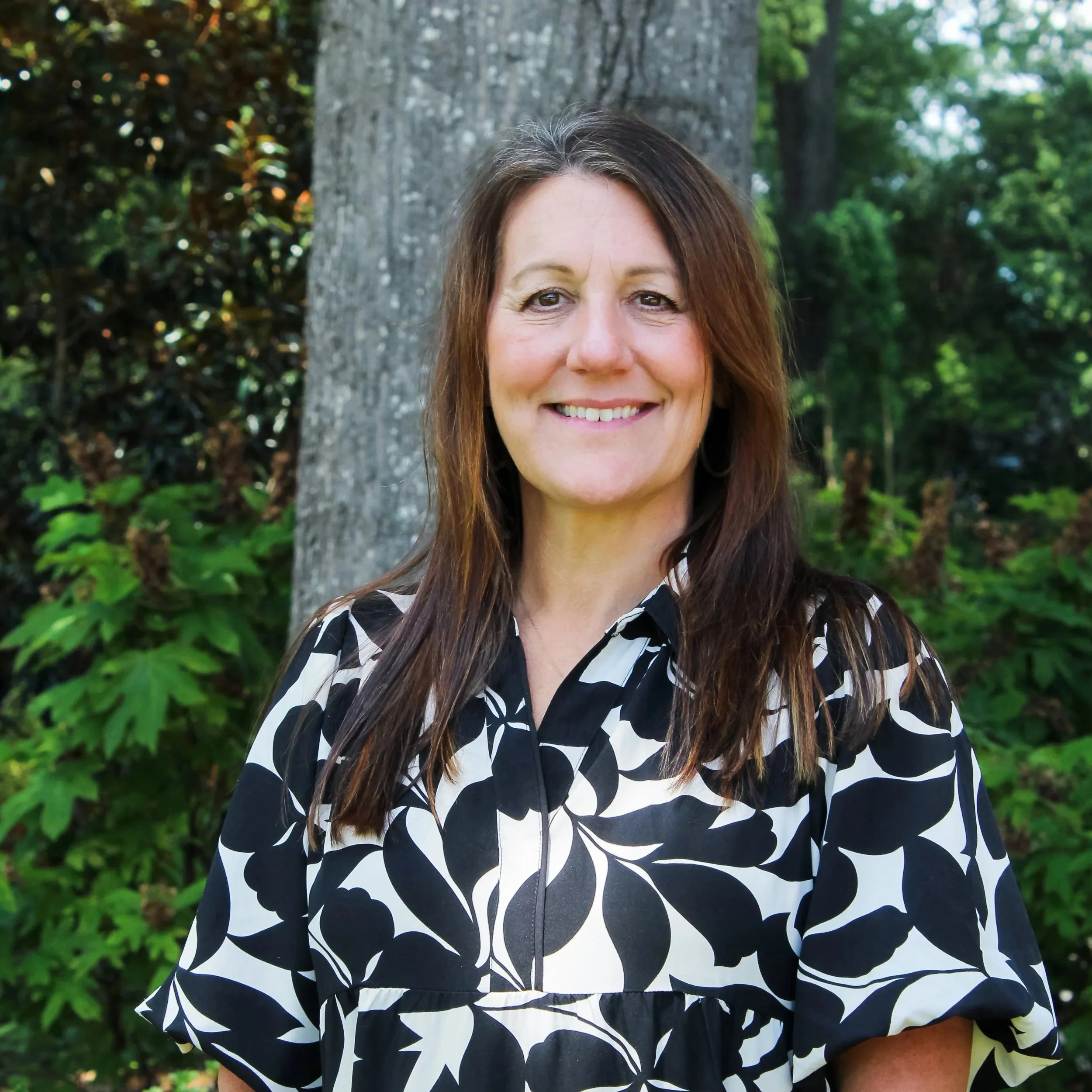 Headshot of Kelly Chester.