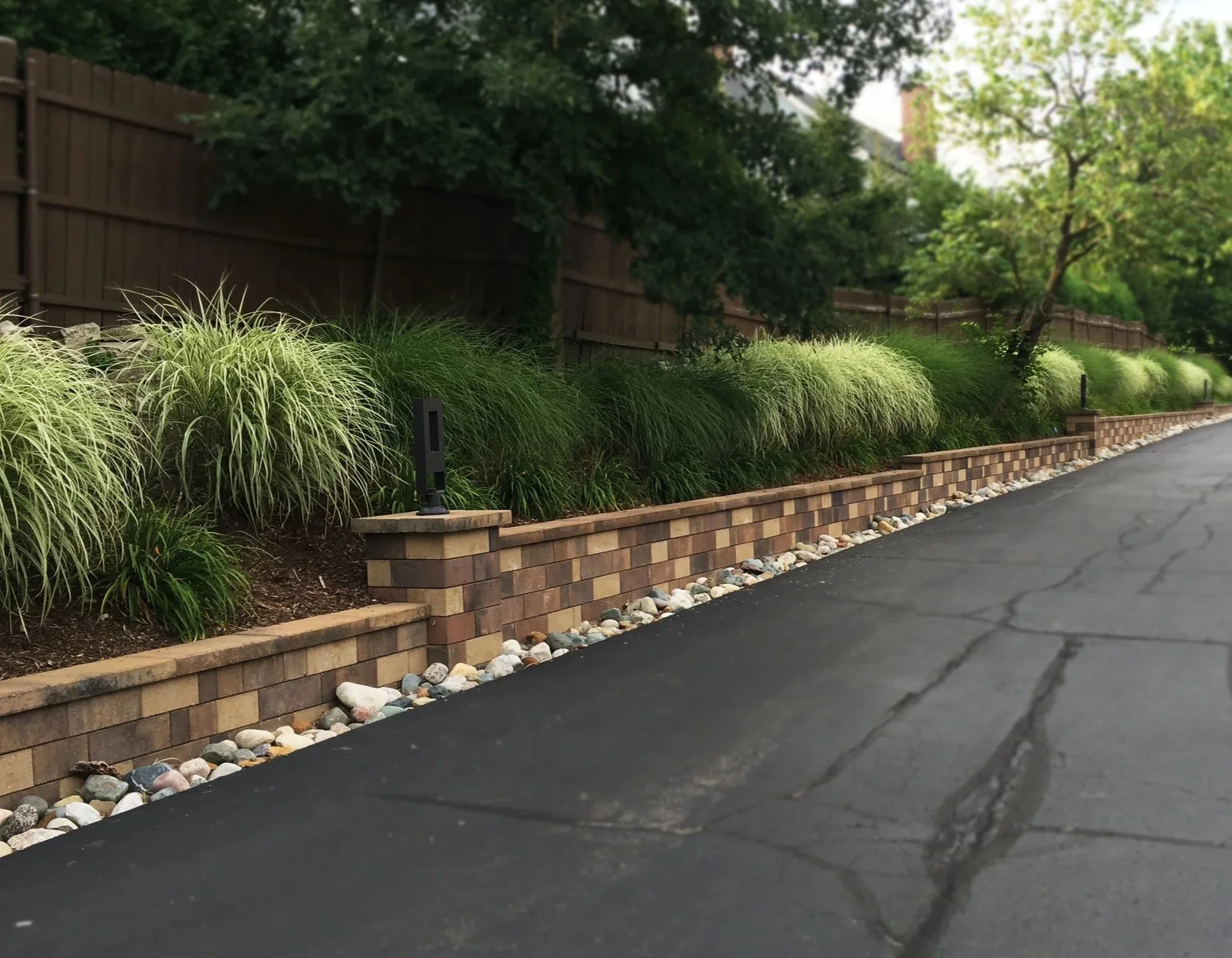 Retaining walls and drainage by Teddy's Lawn and Landscape
